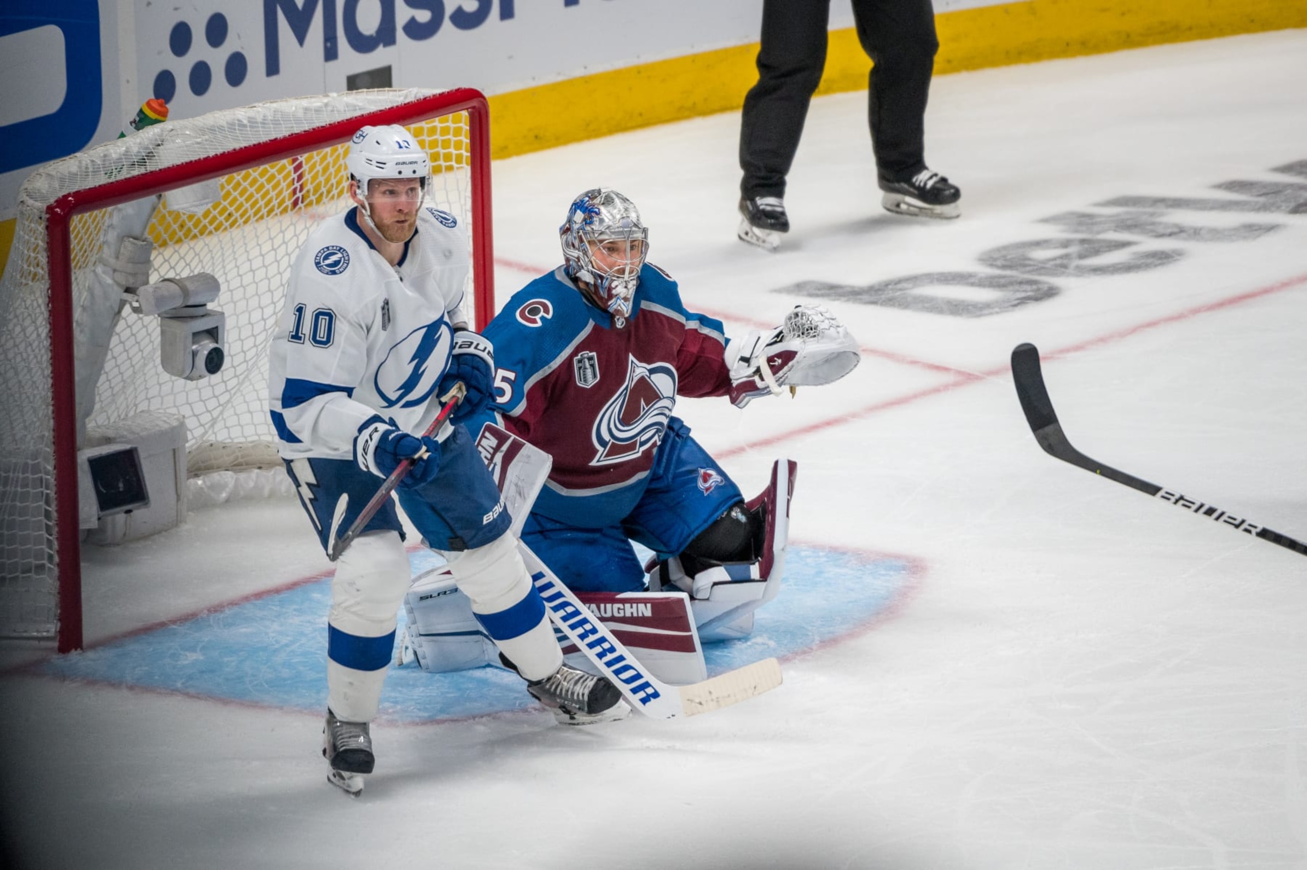 DENVER, CO - JUNE 24: Colorado Avalanche goaltender Darcy Kuemper (35) defends the net against Tampa Bay Lightning right wing Corey Perry (10) during game 5 of the Stanley Cup Finals between the Tampa Bay Lightning and the Colorado Avalanche at Ball Arena in Denver, Colorado, on June 24, 2022. (Photo by Mark Stahl/Icon Sportswire via Getty Images)