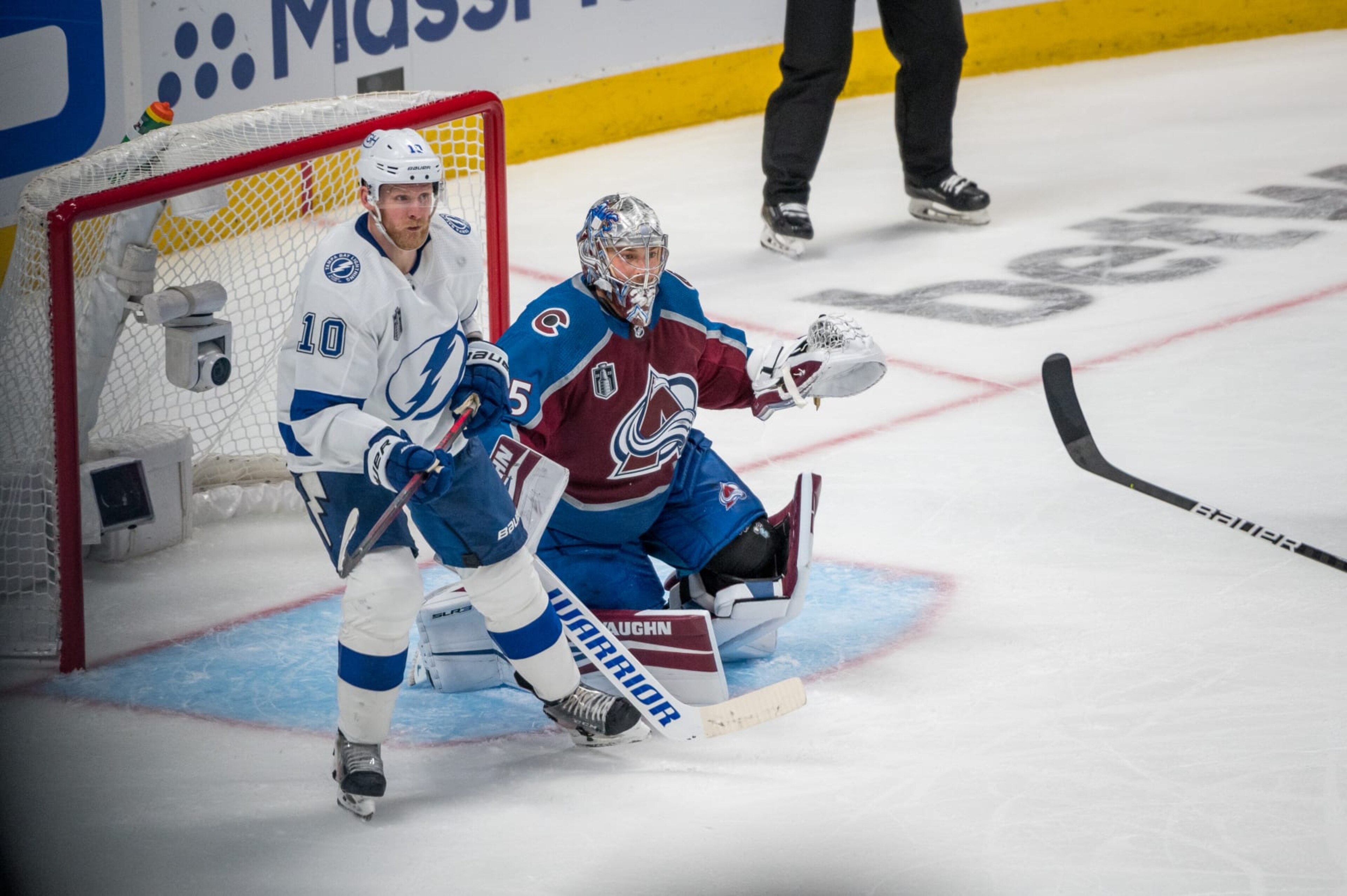 DENVER, CO - JUNE 24: Colorado Avalanche goaltender Darcy Kuemper (35) defends the net against Tampa Bay Lightning right wing Corey Perry (10) during game 5 of the Stanley Cup Finals between the Tampa Bay Lightning and the Colorado Avalanche at Ball Arena in Denver, Colorado, on June 24, 2022. (Photo by Mark Stahl/Icon Sportswire via Getty Images)