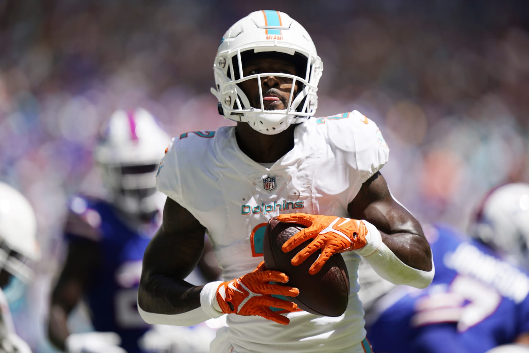 Miami Dolphins running back Chase Edmonds (2) scores a touchdown during the first half of an NFL football game against the Buffalo Bills, Sunday, Sept. 25, 2022, in Miami Gardens, Fla. (AP Photo/Wilfredo Lee )