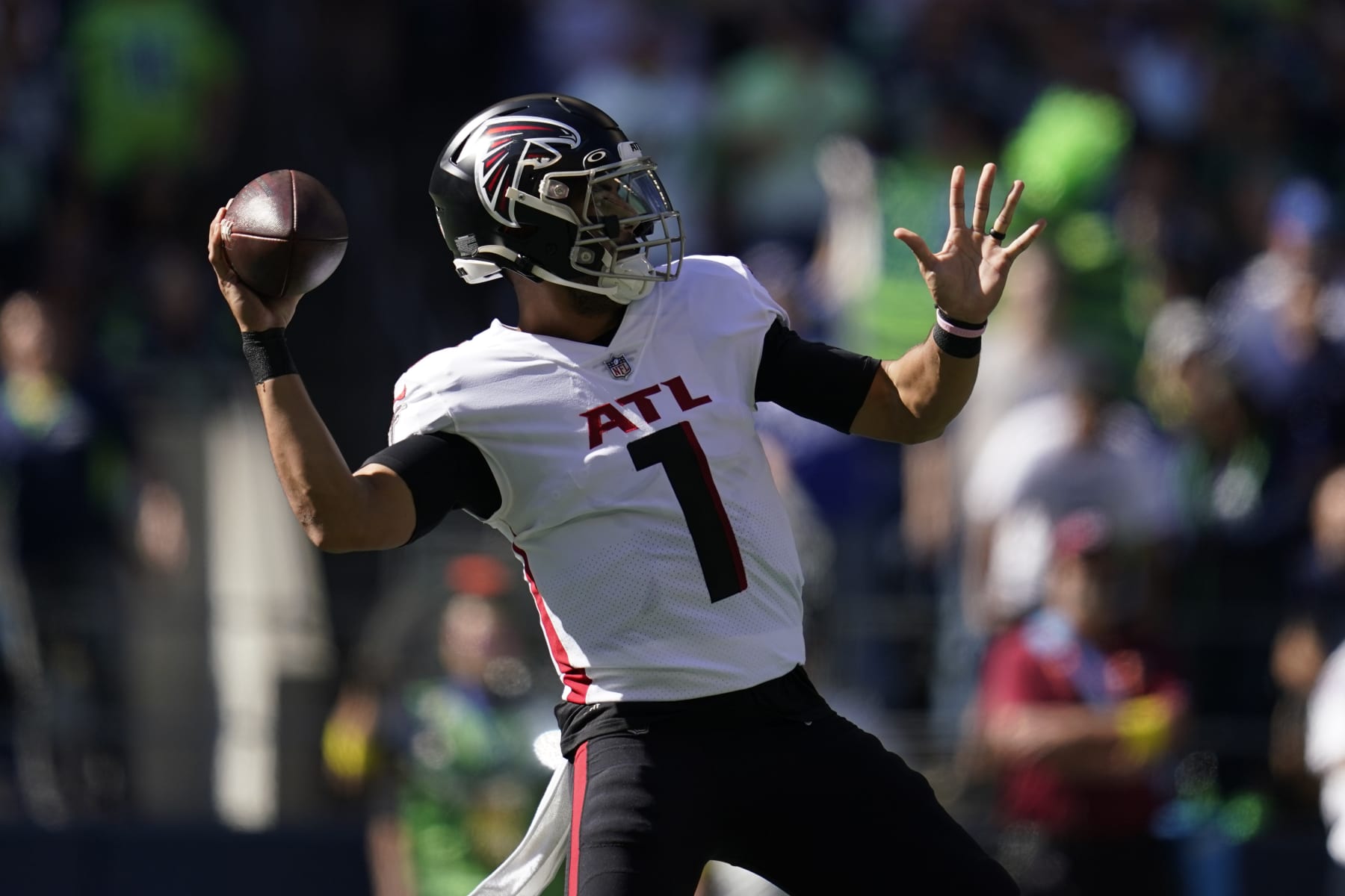 Atlanta Falcons quarterback Marcus Mariota throws a pass during the first half of an NFL football game against the Seattle Seahawks, Sunday, Sept. 25, 2022, in Seattle. (AP Photo/Ashley Landis)