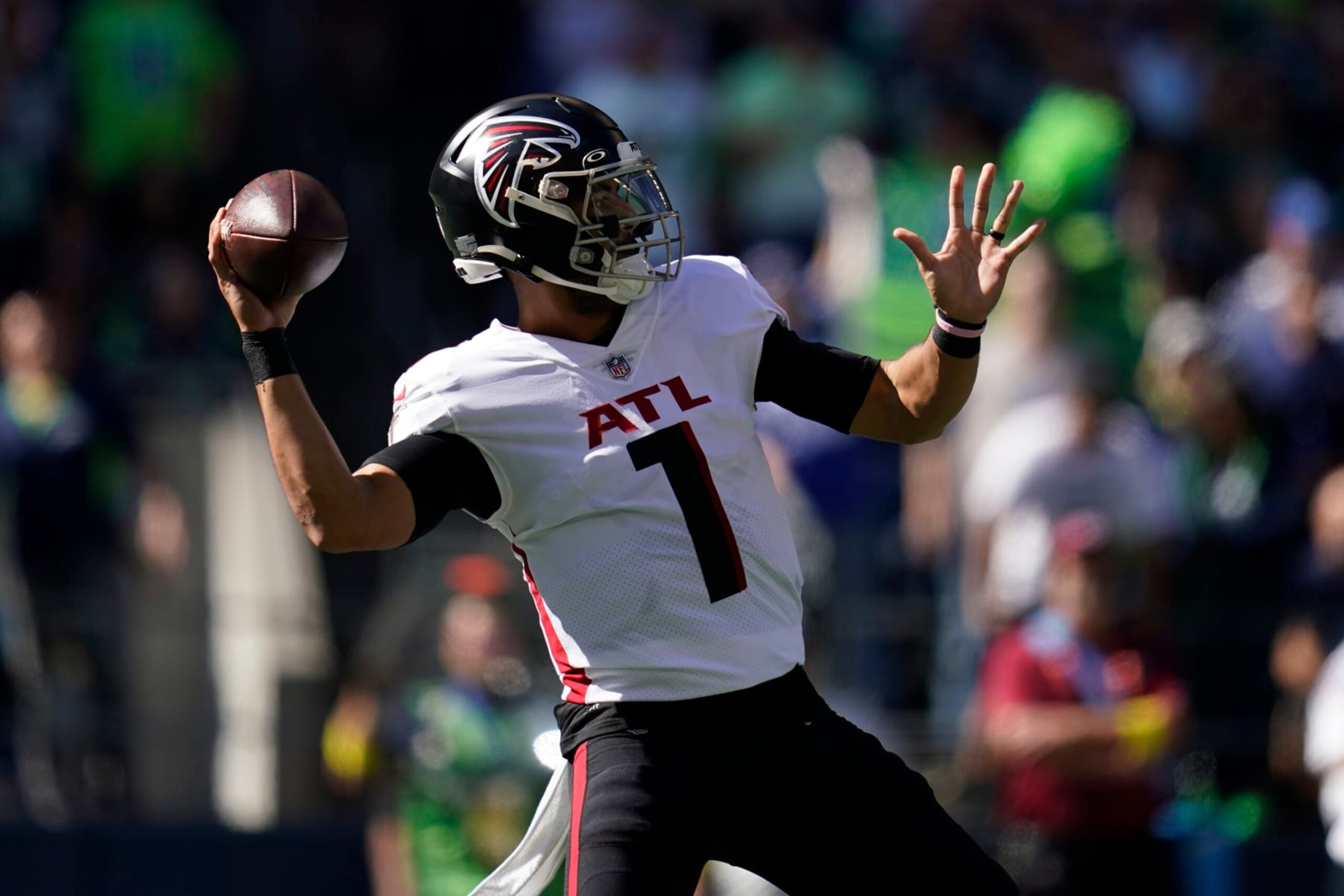 Atlanta Falcons quarterback Marcus Mariota throws a pass during the first half of an NFL football game against the Seattle Seahawks, Sunday, Sept. 25, 2022, in Seattle. (AP Photo/Ashley Landis)