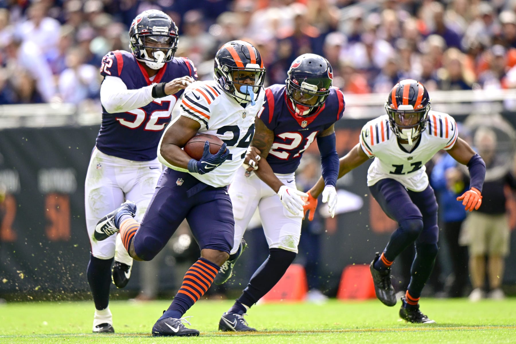CHICAGO, ILLINOIS - SEPTEMBER 25: Khalil Herbert #24 of the Chicago Bears rushes for a first down in the second half against the Houston Texans at Soldier Field on September 25, 2022 in Chicago, Illinois. (Photo by Quinn Harris/Getty Images)