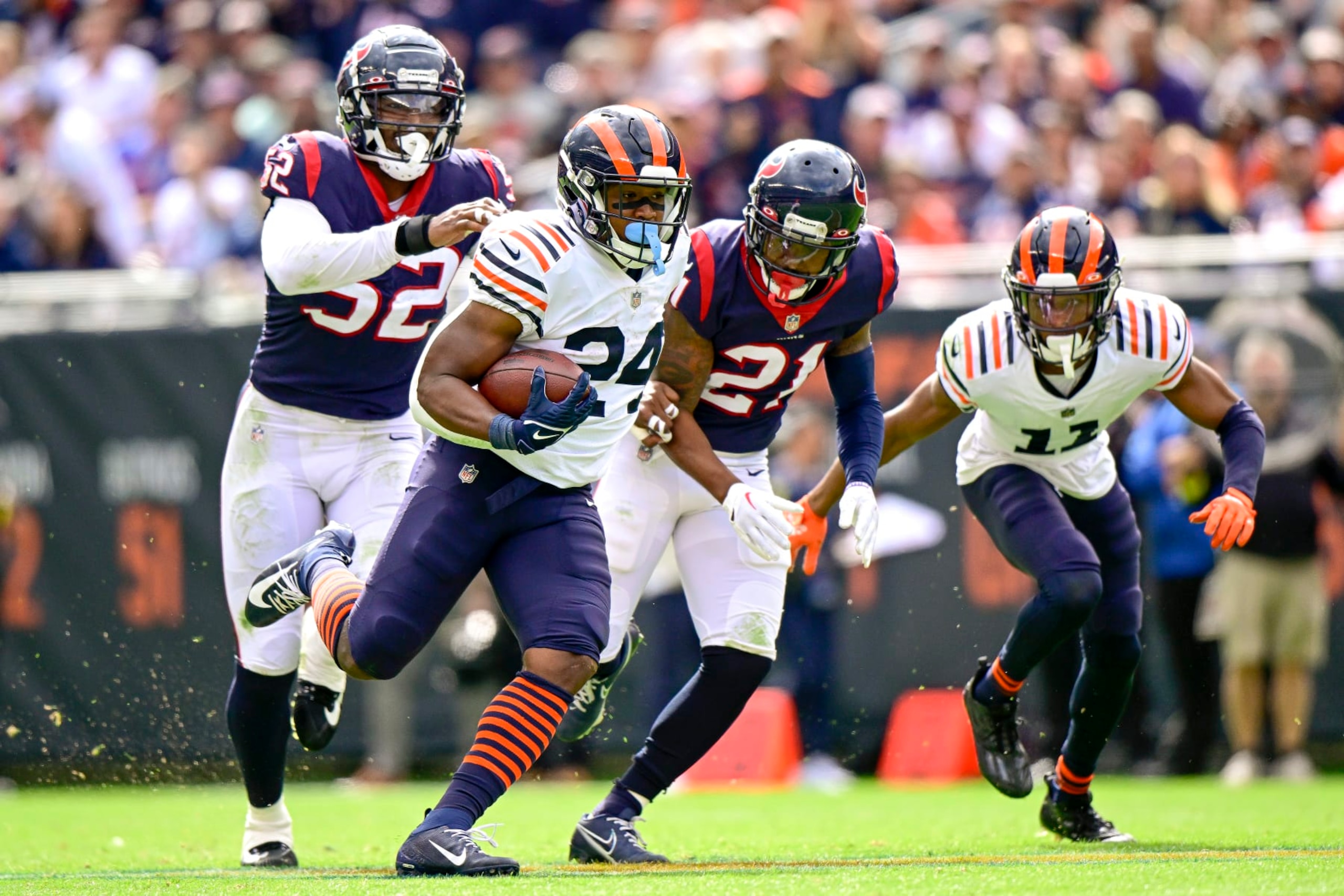 CHICAGO, ILLINOIS - SEPTEMBER 25: Khalil Herbert #24 of the Chicago Bears rushes for a first down in the second half against the Houston Texans at Soldier Field on September 25, 2022 in Chicago, Illinois. (Photo by Quinn Harris/Getty Images)