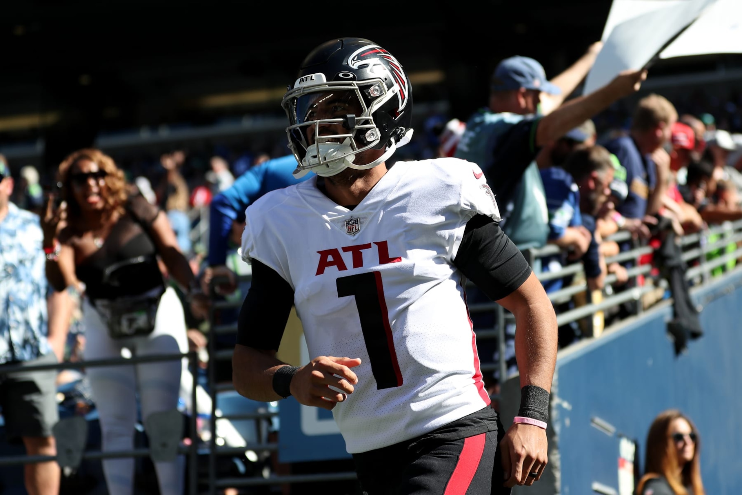 SEATTLE, WASHINGTON - SEPTEMBER 25: Marcus Mariota #1 of the Atlanta Falcons runs on the field before the game against the Seattle Seahawks at Lumen Field on September 25, 2022 in Seattle, Washington. (Photo by Steph Chambers/Getty Images)