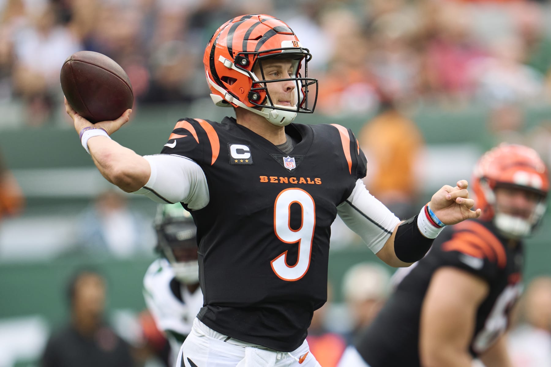 EAST RUTHERFORD, NJ - SEPTEMBER 25: Joe Burrow #9 of the Cincinnati Bengals drops back to pass against the New York Jets at MetLife Stadium on September 25, 2022 in East Rutherford, New Jersey. (Photo by Cooper Neill/Getty Images)
