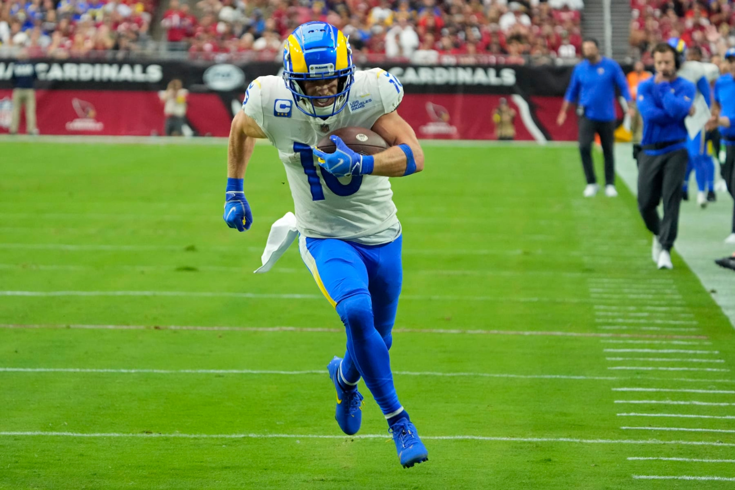 Los Angeles Rams wide receiver Cooper Kupp (10) runs for a touchdown against the Arizona Cardinals during the first half of an NFL football game, Sunday, Sept. 25, 2022, in Glendale, Ariz. (AP Photo/Rick Scuteri) Los Angeles Rams wide receiver Cooper Kupp (10) runs for a touchdown against the Arizona Cardinals during the first half of an NFL football game, Sunday, Sept. 25, 2022, in Glendale, Ariz. (AP Photo/Rick Scuteri)