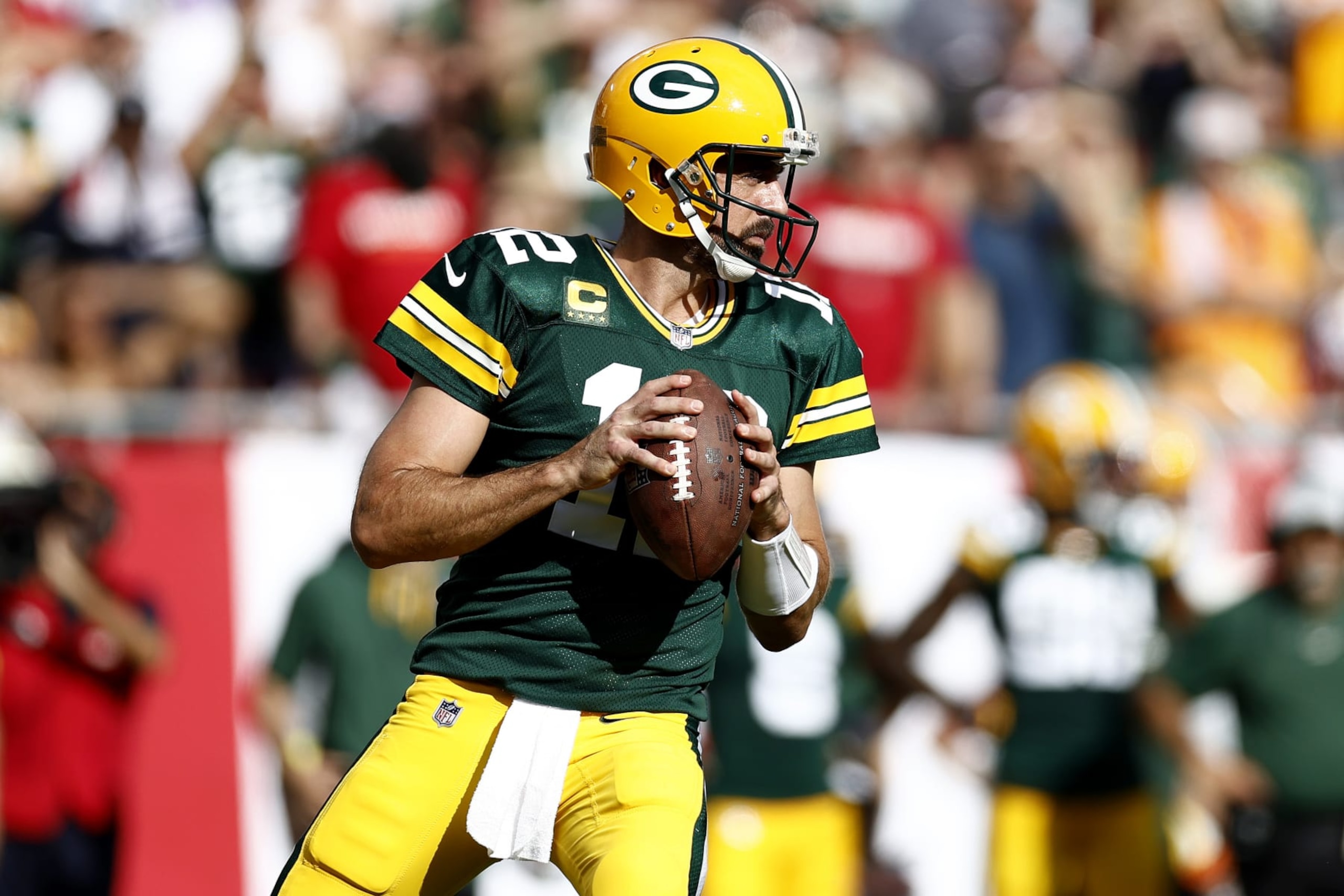 TAMPA, FLORIDA - SEPTEMBER 25: Aaron Rodgers #12 of the Green Bay Packers looks to throw a pass against the Tampa Bay Buccaneers during the second quarter in the game at Raymond James Stadium on September 25, 2022 in Tampa, Florida. (Photo by Douglas P. DeFelice/Getty Images)