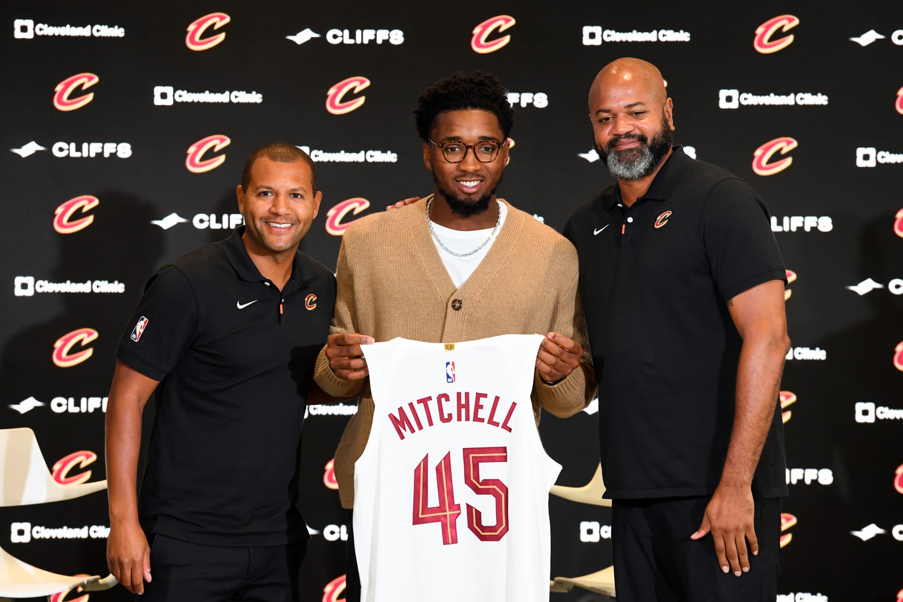 CLEVELAND, OHIO - SEPTEMBER 14: (L to R) Cleveland Cavaliers president of basketball operations Koby Altman, Donovan Mitchell and head coach J. B. Bickerstaff pose for a photo during a press conference where Mitchell was introduced at Rocket Mortgage Fieldhouse on September 14, 2022 in Cleveland, Ohio. NOTE TO USER: User expressly acknowledges and agrees that, by downloading and or using this Photograph, User is consenting to the terms and conditions of the Getty Images License Agreement. (Photo by Nick Cammett/Getty Images)