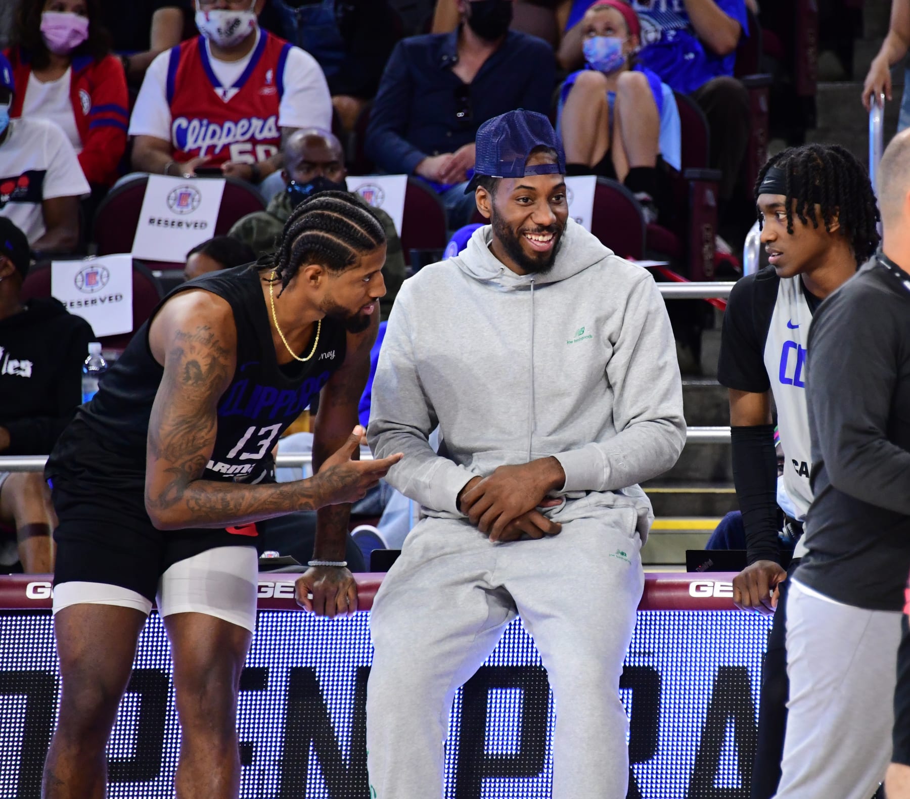 LOS ANGELES, CA - OCTOBER 17: Paul George #13 and Kawhi Leonard #2 of the LA Clippers talk during an open practice at the Galen Center at the University of Southern California on October 17, 2021 in Los Angeles, California. NOTE TO USER: User expressly acknowledges and agrees that, by downloading and/or using this Photograph, user is consenting to the terms and conditions of the Getty Images License Agreement. Mandatory Copyright Notice: Copyright 2021 NBAE (Photo by Adam Pantozzi/NBAE via Getty Images)