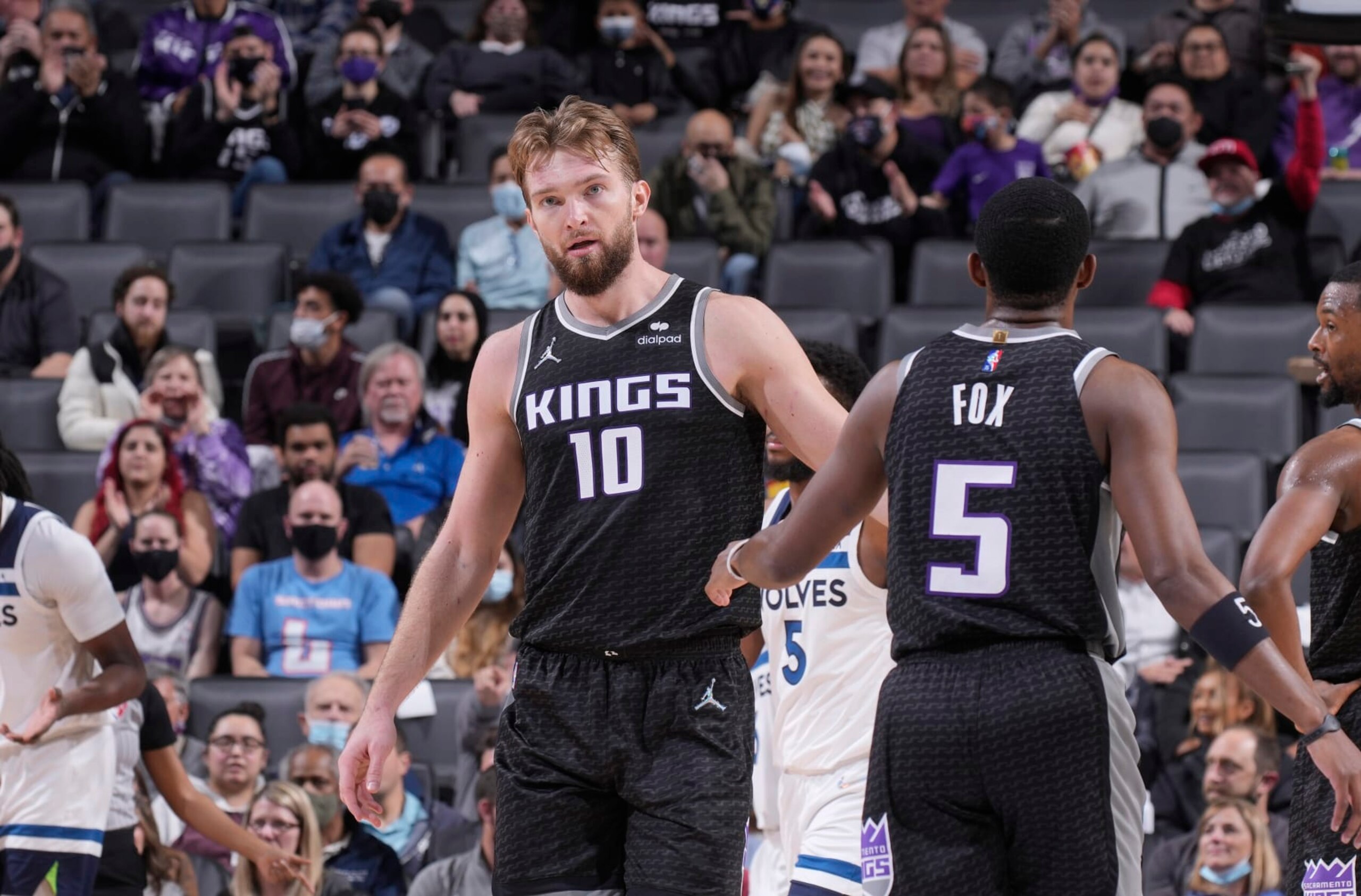 SACRAMENTO, CA - FEBRUARY 9: Domantas Sabonis #10 and De'Aaron Fox #5 of the Sacramento Kings high five during the game against the Minnesota Timberwolves on February 9, 2022 at Golden 1 Center in Sacramento, California. NOTE TO USER: User expressly acknowledges and agrees that, by downloading and or using this photograph, User is consenting to the terms and conditions of the Getty Images Agreement. Mandatory Copyright Notice: Copyright 2022 NBAE (Photo by Rocky Widner/NBAE via Getty Images) SACRAMENTO, CA - FEBRUARY 9: Domantas Sabonis #10 and De'Aaron Fox #5 of the Sacramento Kings high five during the game against the Minnesota Timberwolves on February 9, 2022 at Golden 1 Center in Sacramento, California. NOTE TO USER: User expressly acknowledges and agrees that, by downloading and or using this photograph, User is consenting to the terms and conditions of the Getty Images Agreement. Mandatory Copyright Notice: Copyright 2022 NBAE (Photo by Rocky Widner/NBAE via Getty Images)