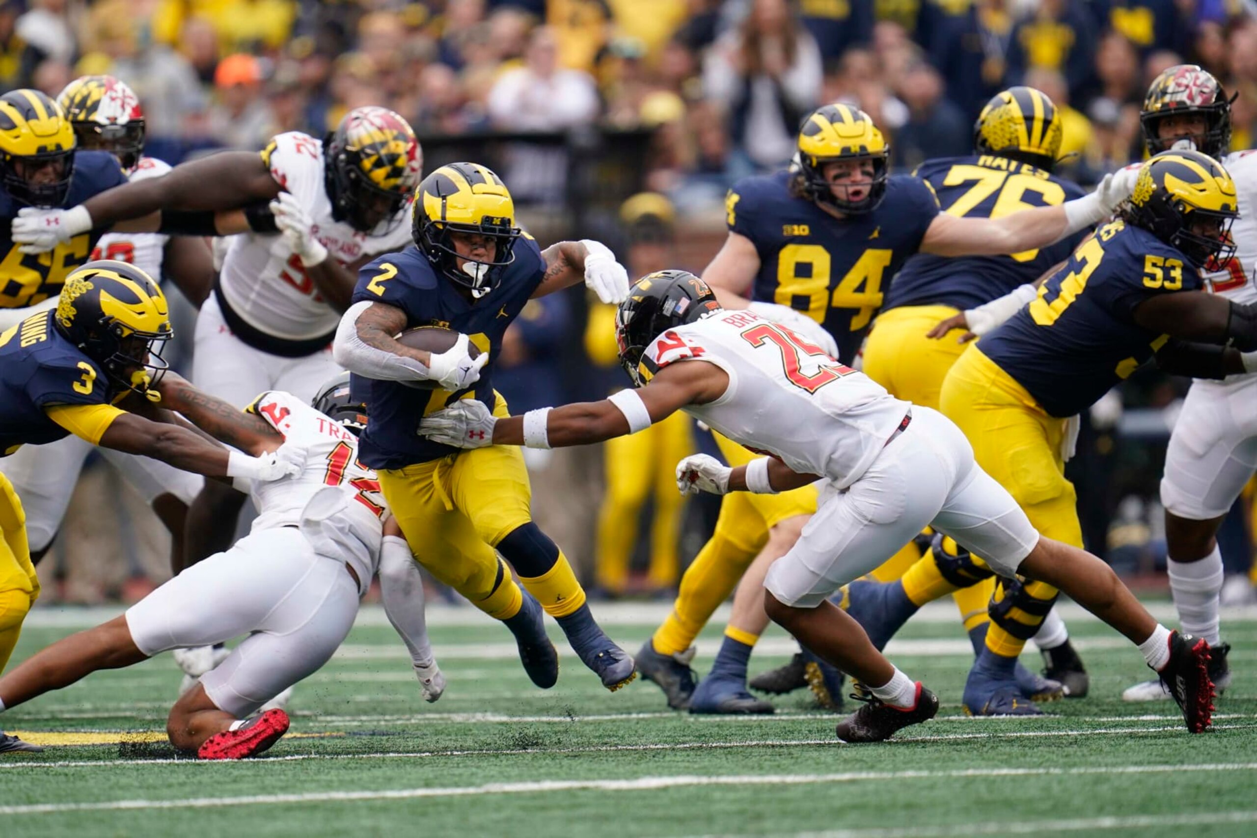 DUPLICATE***Michigan running back Blake Corum (2) makes a move on Maryland defensive back Beau Brade (25) in the first half of an NCAA college football game in Ann Arbor, Mich., Saturday, Sept. 24, 2022. (AP Photo/Paul Sancya) DUPLICATE***Michigan running back Blake Corum (2) makes a move on Maryland defensive back Beau Brade (25) in the first half of an NCAA college football game in Ann Arbor, Mich., Saturday, Sept. 24, 2022. (AP Photo/Paul Sancya)