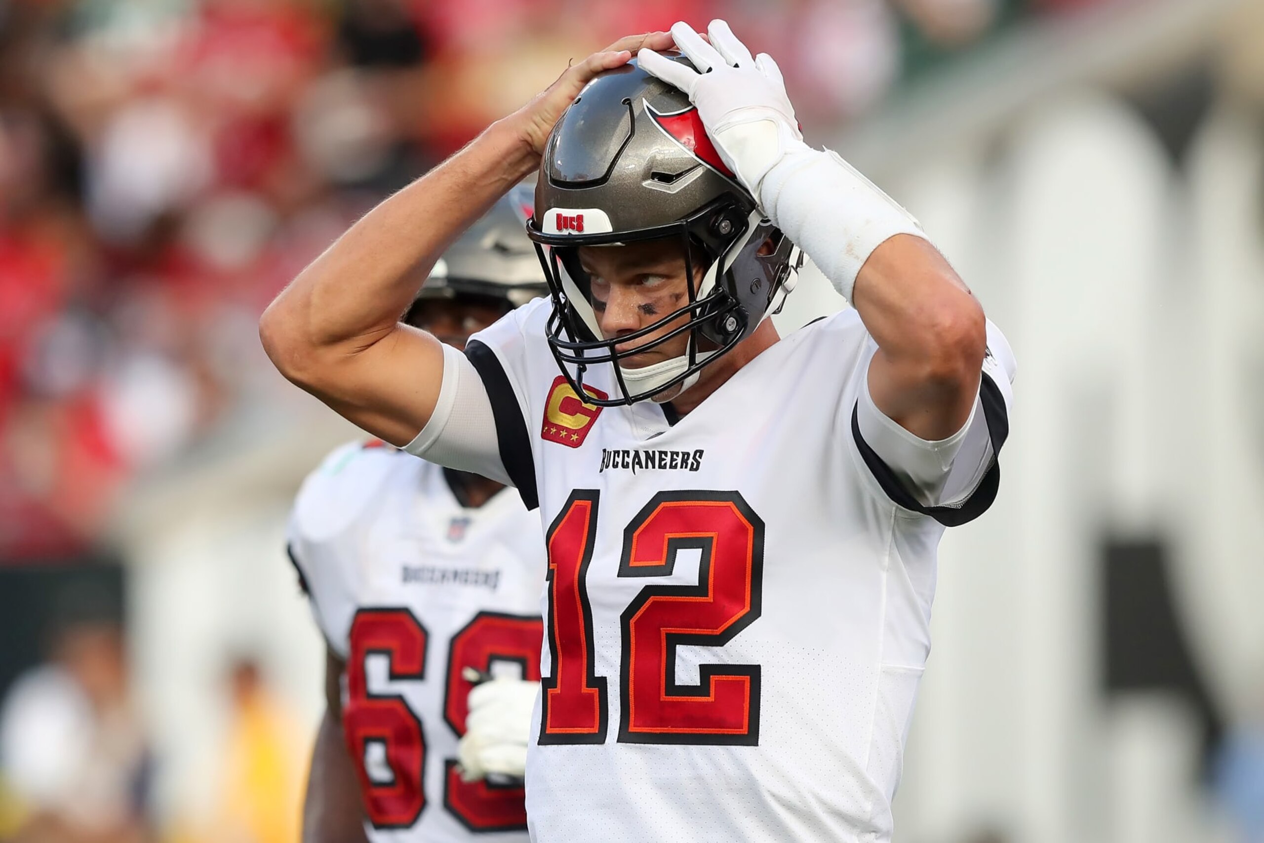 TAMPA, FL - SEPTEMBER 25: Tampa Bay Buccaneers Quarterback Tom Brady (12) reacts to the results of a play during the regular season game between the Green Bay Packers and the Tampa Bay Buccaneers on September 25, 2022 at Raymond James Stadium in Tampa, Florida. (Photo by Cliff Welch/Icon Sportswire via Getty Images) TAMPA, FL - SEPTEMBER 25: Tampa Bay Buccaneers Quarterback Tom Brady (12) reacts to the results of a play during the regular season game between the Green Bay Packers and the Tampa Bay Buccaneers on September 25, 2022 at Raymond James Stadium in Tampa, Florida. (Photo by Cliff Welch/Icon Sportswire via Getty Images)