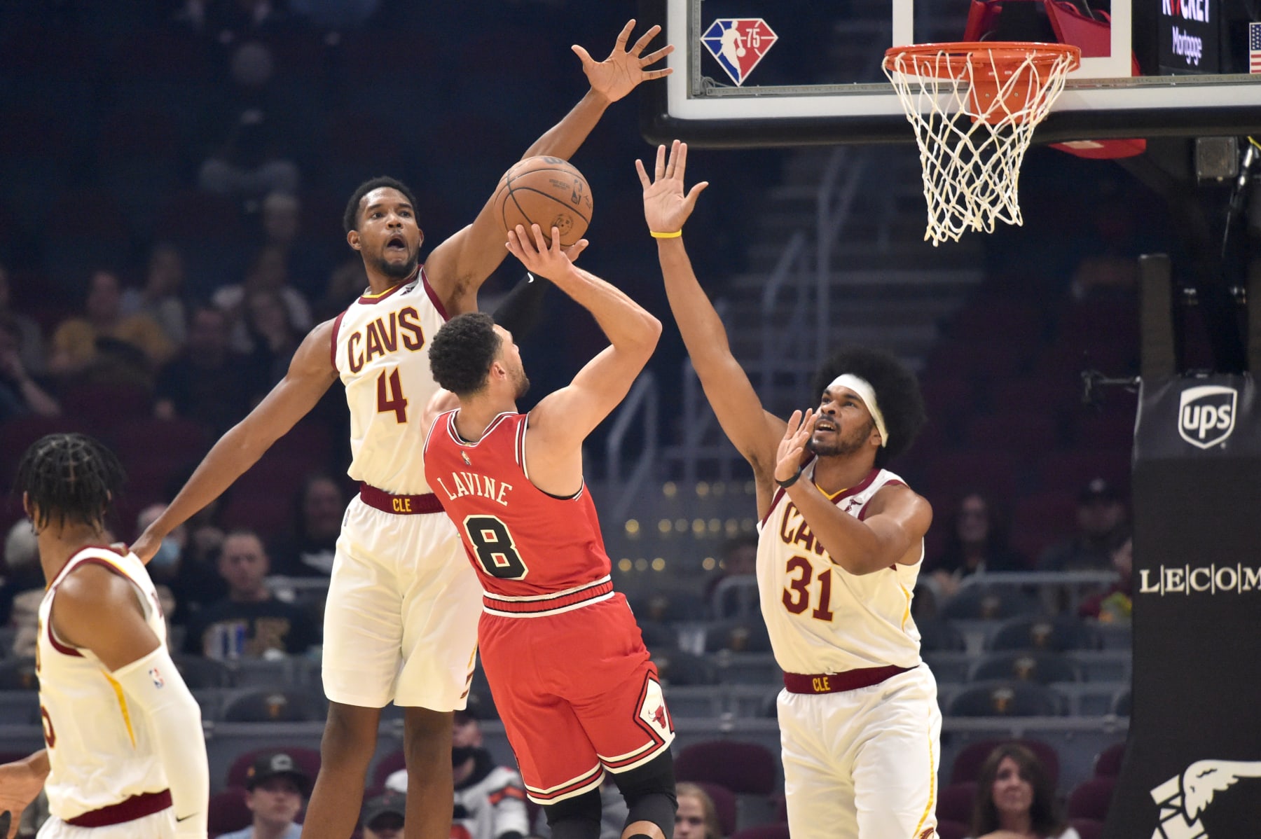 CLEVELAND, OHIO - OCTOBER 10: Evan Mobley #4 and Jarrett Allen #31 of the Cleveland Cavaliers try to block Zach LaVine #8 of the Chicago Bulls during the second quarter at Rocket Mortgage Fieldhouse on October 10, 2021 in Cleveland, Ohio. NOTE TO USER: User expressly acknowledges and agrees that, by downloading and/or using this photograph, user is consenting to the terms and conditions of the Getty Images License Agreement. (Photo by Jason Miller/Getty Images)