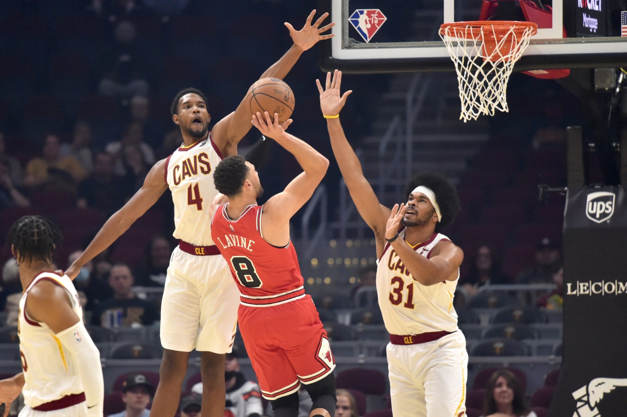 CLEVELAND, OHIO - OCTOBER 10: Evan Mobley #4 and Jarrett Allen #31 of the Cleveland Cavaliers try to block Zach LaVine #8 of the Chicago Bulls during the second quarter at Rocket Mortgage Fieldhouse on October 10, 2021 in Cleveland, Ohio. NOTE TO USER: User expressly acknowledges and agrees that, by downloading and/or using this photograph, user is consenting to the terms and conditions of the Getty Images License Agreement. (Photo by Jason Miller/Getty Images)
