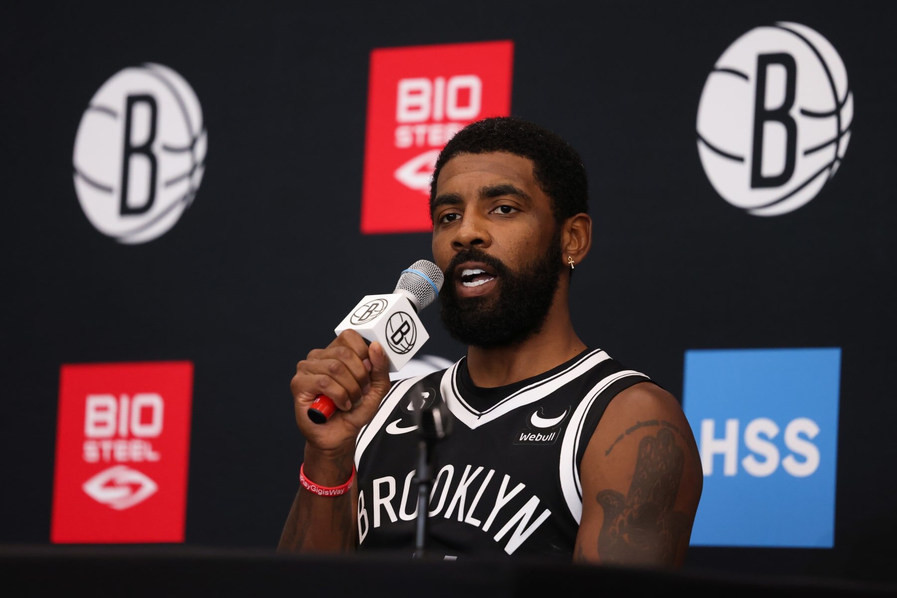 NEW YORK, NEW YORK - SEPTEMBER 26: Kyrie Irving #11 of the Brooklyn Nets speaks during a press conference at Brooklyn Nets Media Day at HSS Training Center on September 26, 2022 in the Brooklyn borough of New York City. NOTE TO USER: User expressly acknowledges and agrees that, by downloading and/or using this photograph, User is consenting to the terms and conditions of the Getty Images License Agreement. (Photo by Dustin Satloff/Getty Images)