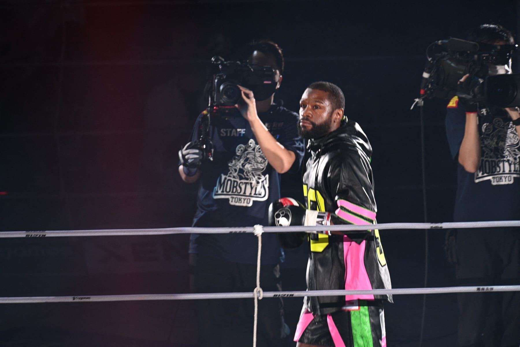 US boxer Floyd Mayweather (C) arrives for his exhibition match against Japanese mixed martial artist Mikuru Asakura at the Saitama Super Arena in Saitama on September 25, 2022. (Photo by Philip FONG / AFP) (Photo by PHILIP FONG/AFP via Getty Images)