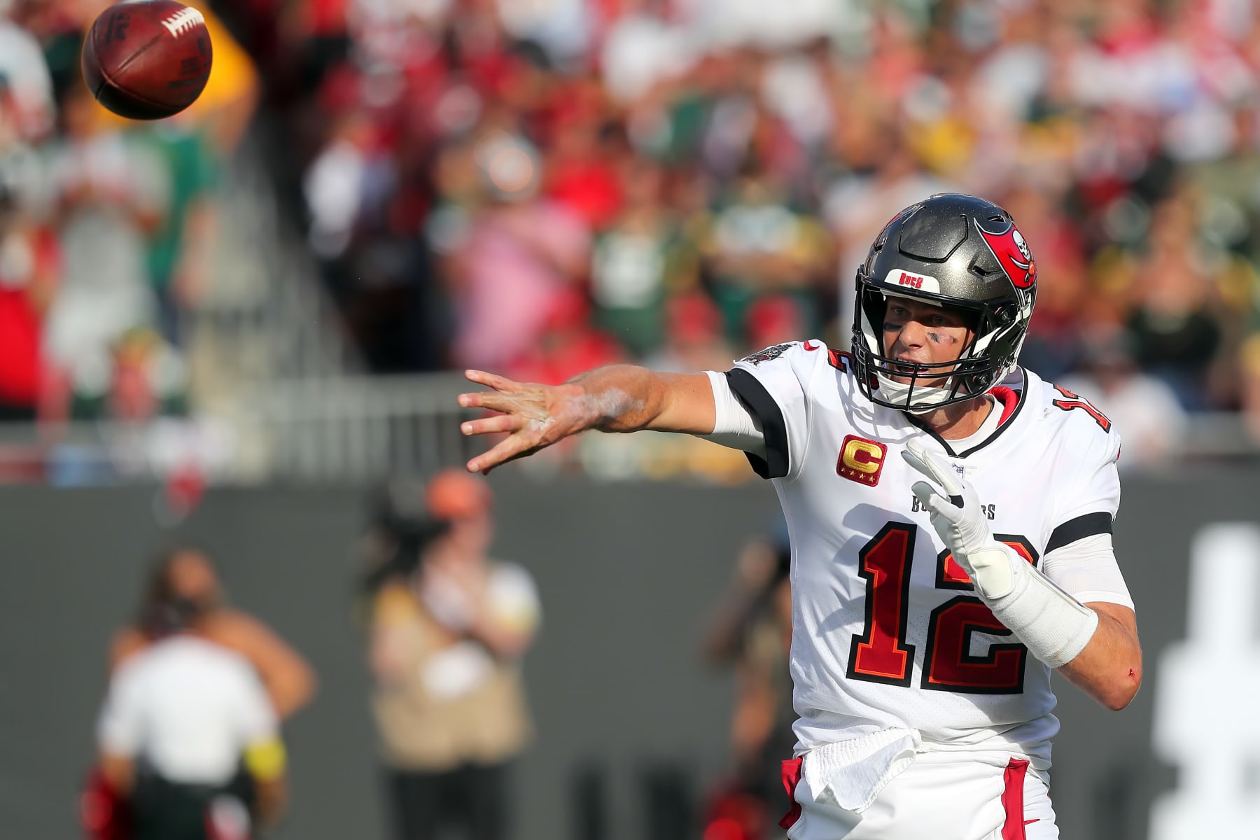TAMPA, FL - SEPTEMBER 25: Tampa Bay Buccaneers Quarterback Tom Brady (12) throws a pass during the regular season game between the Green Bay Packers and the Tampa Bay Buccaneers on September 25, 2022 at Raymond James Stadium in Tampa, Florida. (Photo by Cliff Welch/Icon Sportswire via Getty Images)