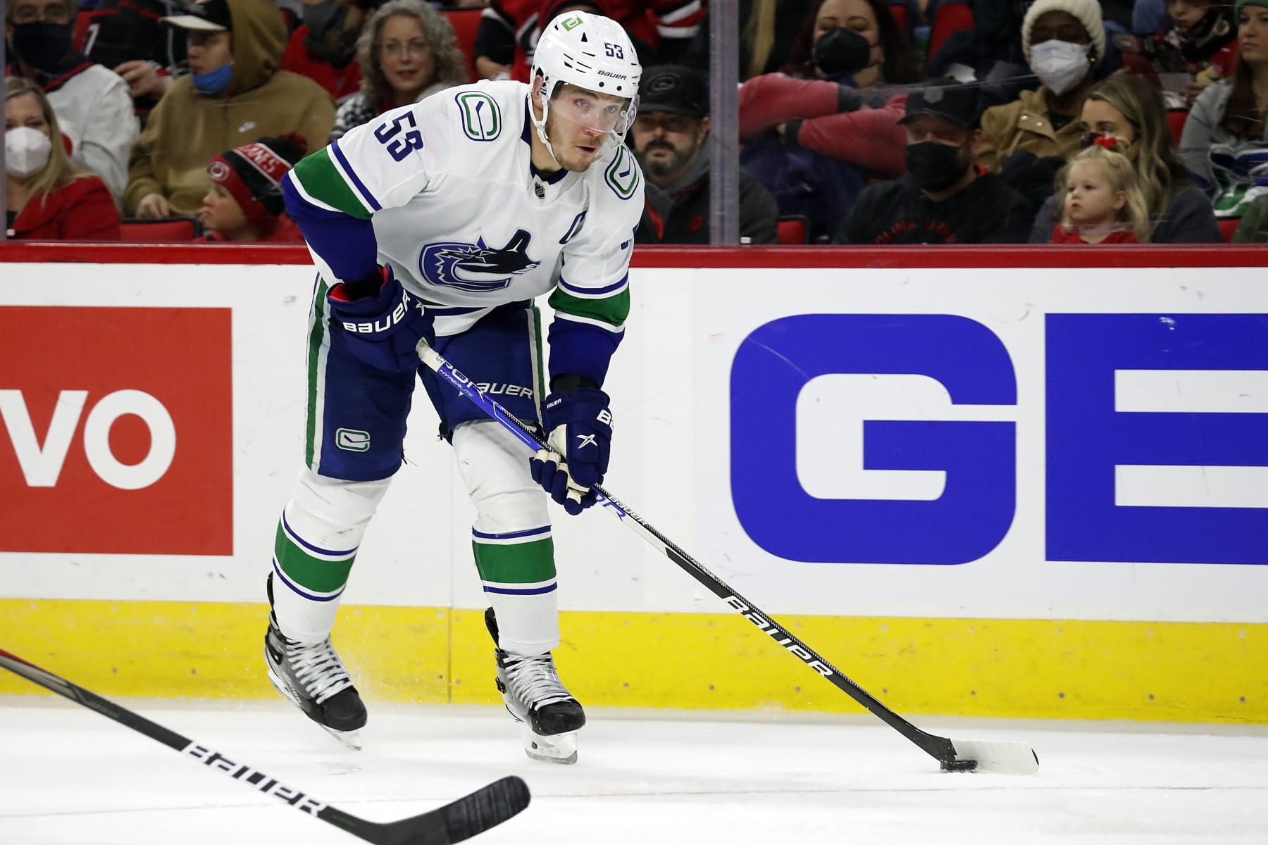 Vancouver Canucks' Bo Horvat (53) looks to shoot the puck during the third period of an NHL hockey game against the Carolina Hurricanes in Raleigh, N.C., Saturday, Jan. 15, 2022. (AP Photo/Karl B DeBlaker)
