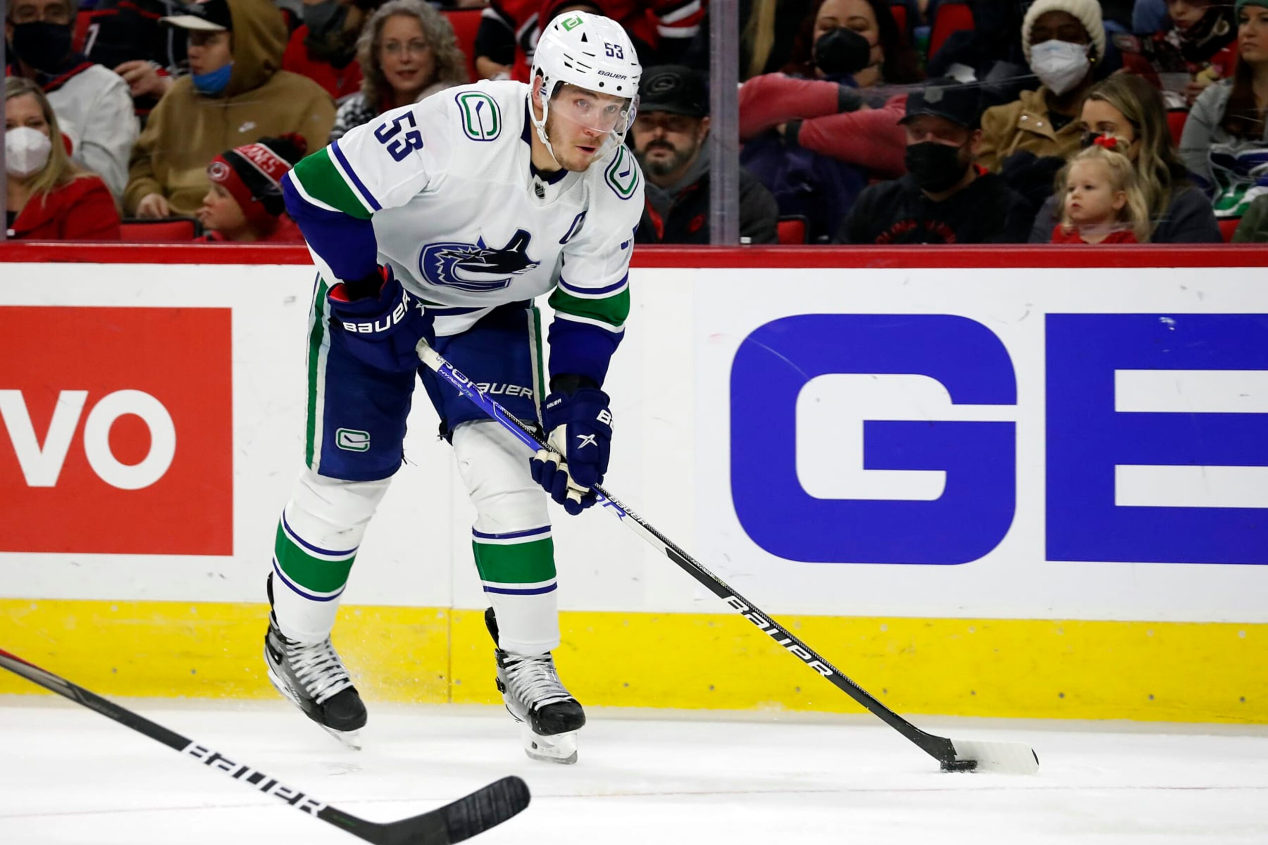 Vancouver Canucks' Bo Horvat (53) looks to shoot the puck during the third period of an NHL hockey game against the Carolina Hurricanes in Raleigh, N.C., Saturday, Jan. 15, 2022. (AP Photo/Karl B DeBlaker)