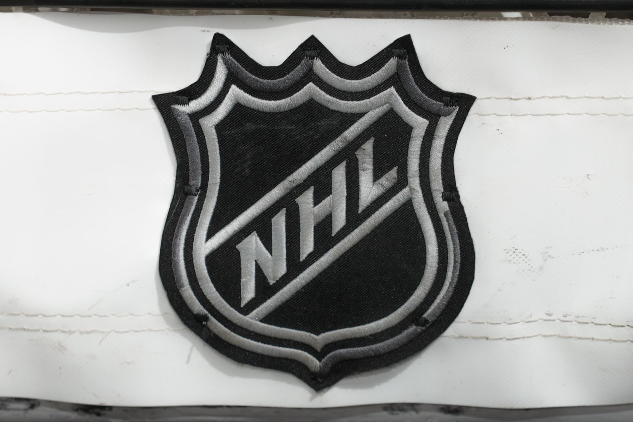 NEWARK, NJ - APRIL 29: A general view of the National Hockey League logo on the back of the goal on April 29, 2022 at the Prudential Center in Newark, New Jersey. (Photo by Rich Graessle/Getty Images) NEWARK, NJ - APRIL 29: A general view of the National Hockey League logo on the back of the goal on April 29, 2022 at the Prudential Center in Newark, New Jersey. (Photo by Rich Graessle/Getty Images)