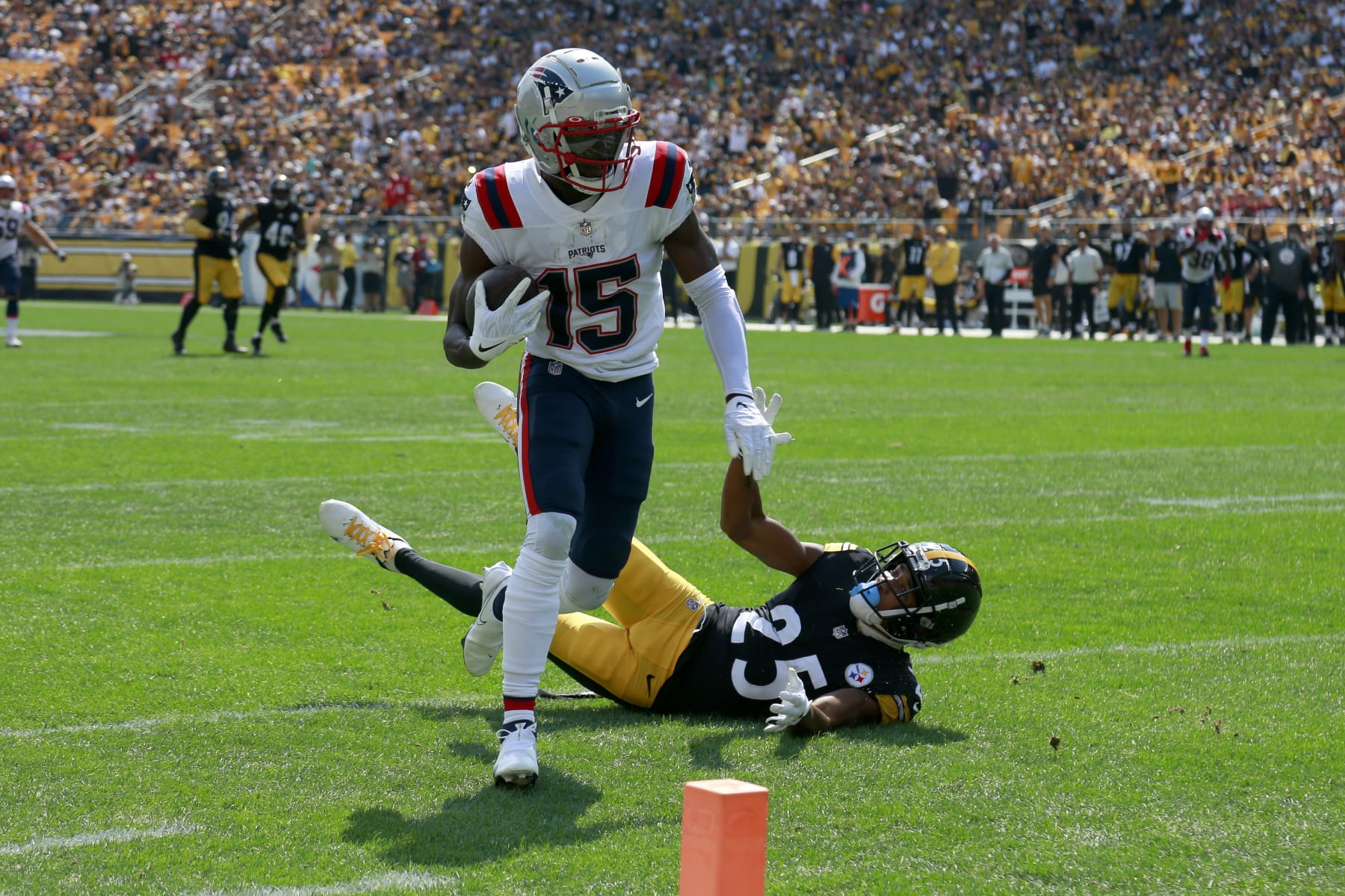 PITTSBURGH, PENNSYLVANIA - SEPTEMBER 18: Nelson Agholor #15 of the New England Patriots scores a touchdown during the first half in the game against the New England Patriots at Acrisure Stadium on September 18, 2022 in Pittsburgh, Pennsylvania. (Photo by Justin K. Aller/Getty Images)