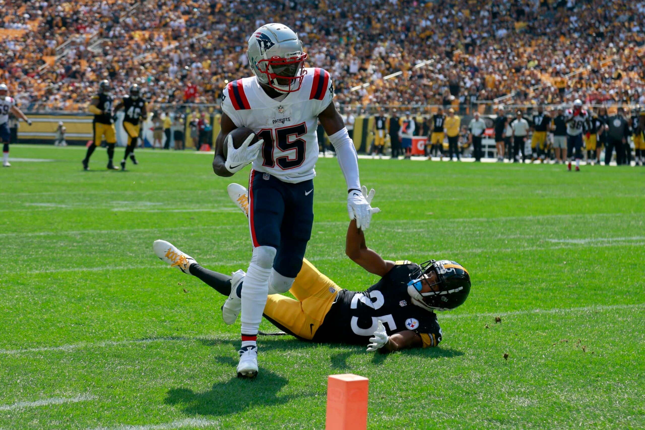 PITTSBURGH, PENNSYLVANIA - SEPTEMBER 18: Nelson Agholor #15 of the New England Patriots scores a touchdown during the first half in the game against the New England Patriots at Acrisure Stadium on September 18, 2022 in Pittsburgh, Pennsylvania. (Photo by Justin K. Aller/Getty Images) PITTSBURGH, PENNSYLVANIA - SEPTEMBER 18: Nelson Agholor #15 of the New England Patriots scores a touchdown during the first half in the game against the New England Patriots at Acrisure Stadium on September 18, 2022 in Pittsburgh, Pennsylvania. (Photo by Justin K. Aller/Getty Images)