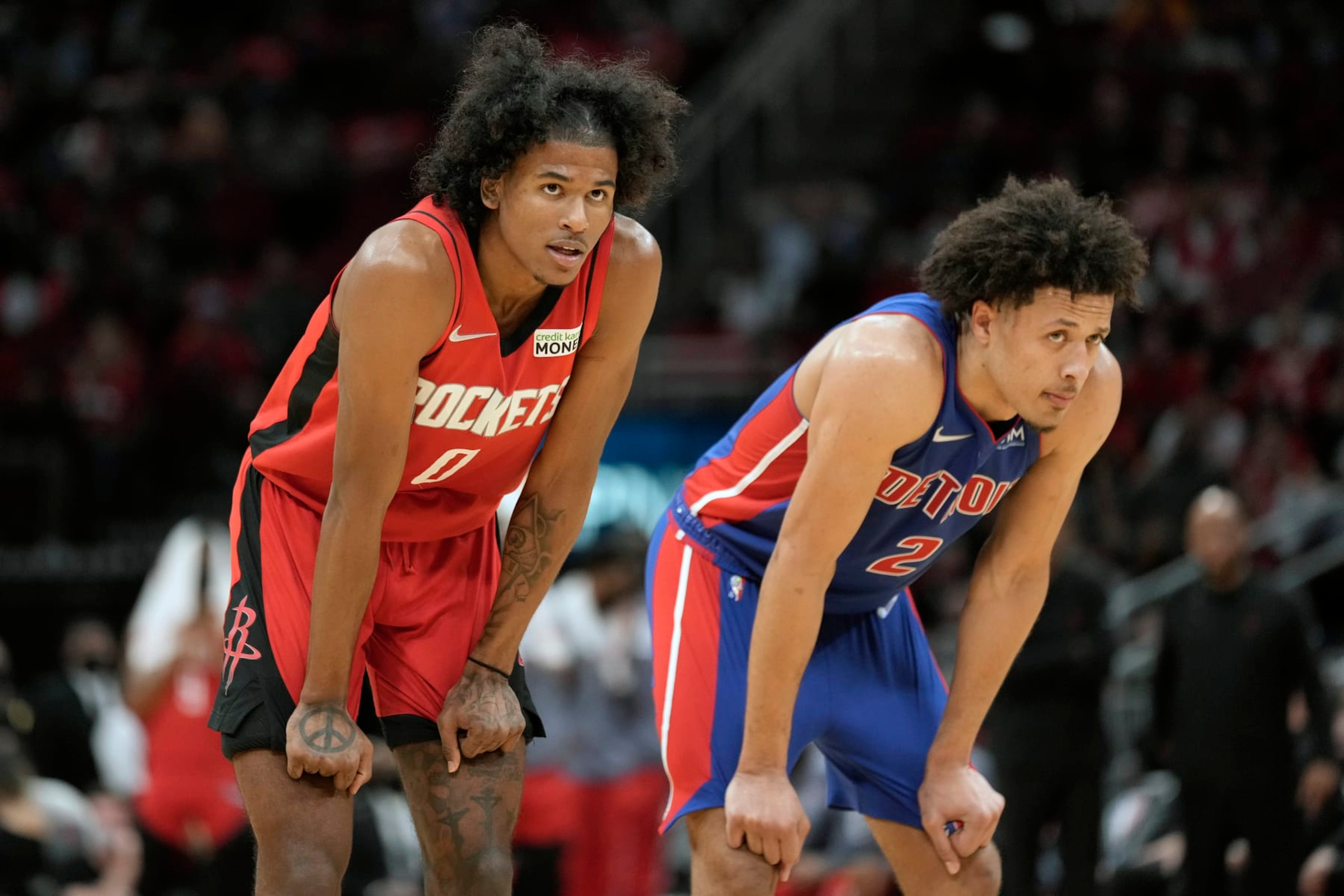 Houston Rockets guard Jalen Green (0) and Detroit Pistons guard Cade Cunningham watch a free throw during the second half of an NBA basketball game, Wednesday, Nov. 10, 2021, in Houston. (AP Photo/Eric Christian Smith) Houston Rockets guard Jalen Green (0) and Detroit Pistons guard Cade Cunningham watch a free throw during the second half of an NBA basketball game, Wednesday, Nov. 10, 2021, in Houston. (AP Photo/Eric Christian Smith)