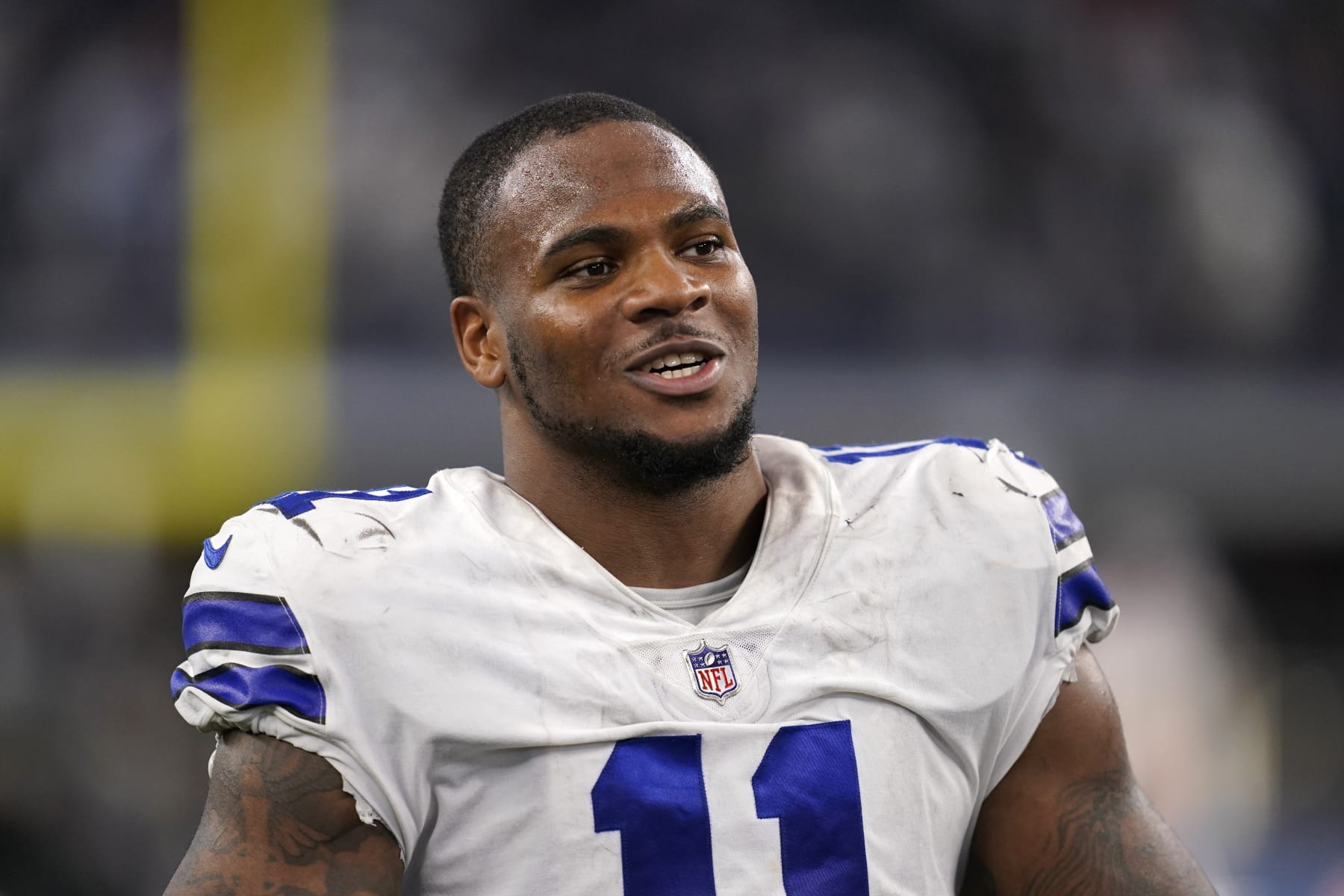 Dallas Cowboys' Micah Parsons visits with Cincinnati Bengals players after their NFL football game in Arlington, Texas, Sunday, Sept. 17, 2022. (AP Photo/Tony Gutierrez)