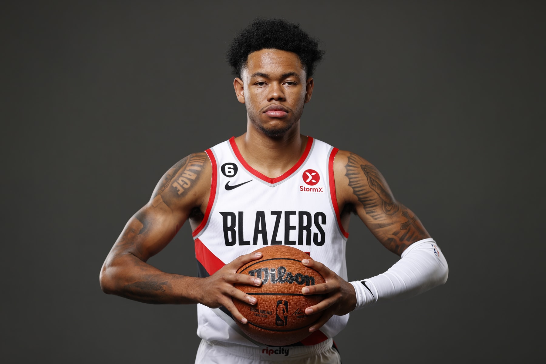 PORTLAND, OREGON - SEPTEMBER 26: Anfernee Simons #1 of the Portland Trail Blazers poses for a portrait during Blazers Media Day at Veterans Memorial Coliseum on September 26, 2022 in Portland, Oregon. NOTE TO USER: User expressly acknowledges and agrees that, by downloading and/or using this photograph, user is consenting to the terms and conditions of the Getty Images License Agreement. (Photo by Steph Chambers/Getty Images)
