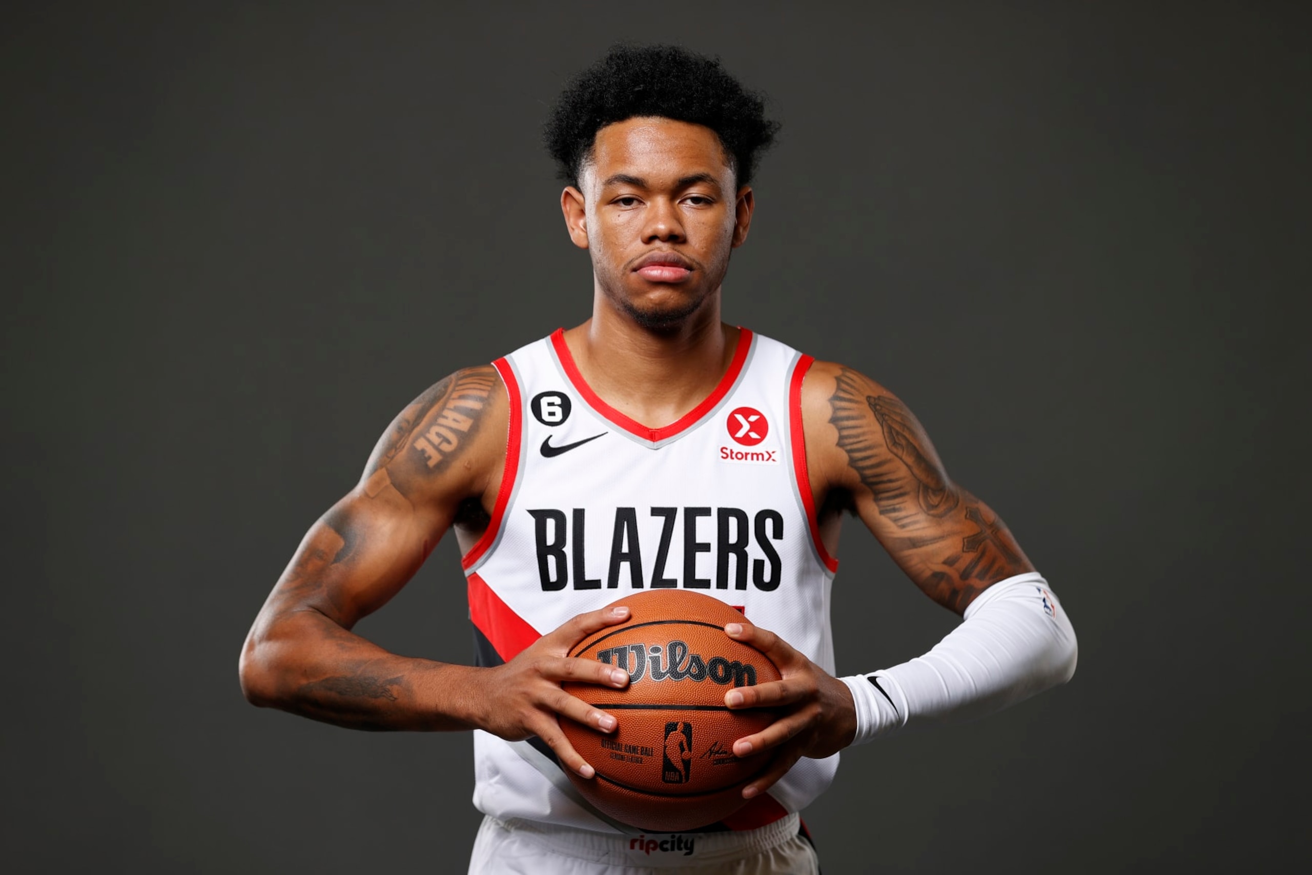 PORTLAND, OREGON - SEPTEMBER 26: Anfernee Simons #1 of the Portland Trail Blazers poses for a portrait during Blazers Media Day at Veterans Memorial Coliseum on September 26, 2022 in Portland, Oregon. NOTE TO USER: User expressly acknowledges and agrees that, by downloading and/or using this photograph, user is consenting to the terms and conditions of the Getty Images License Agreement. (Photo by Steph Chambers/Getty Images)