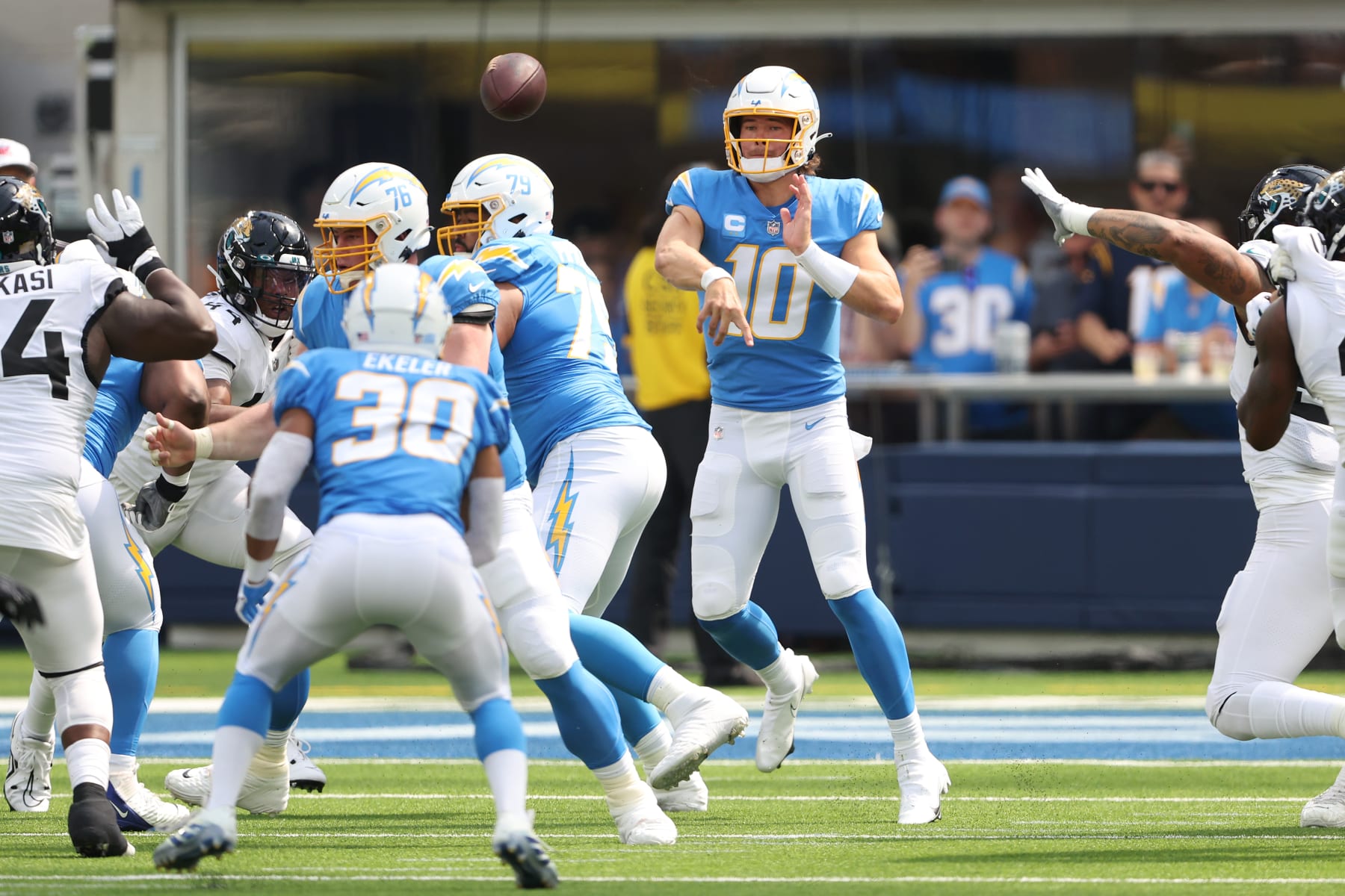 INGLEWOOD, CALIFORNIA - SEPTEMBER 25: Justin Herbert #10 of the Los Angeles Chargers attempts a pass during the first half against the Jacksonville Jaguars at SoFi Stadium on September 25, 2022 in Inglewood, California. (Photo by Sean M. Haffey/Getty Images)