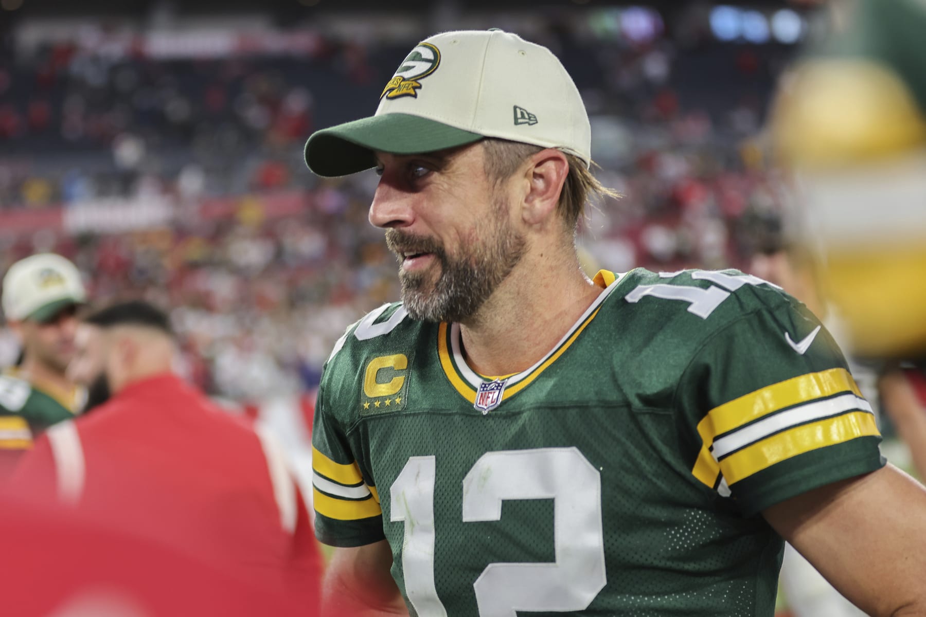 Green Bay Packers quarterback Aaron Rodgers (12) smiles after winning a NFL football game against the Tampa Bay Buccaneers, Sunday, September 25, 2022 in Tampa, Fla. (AP Photo/Alex Menendez)