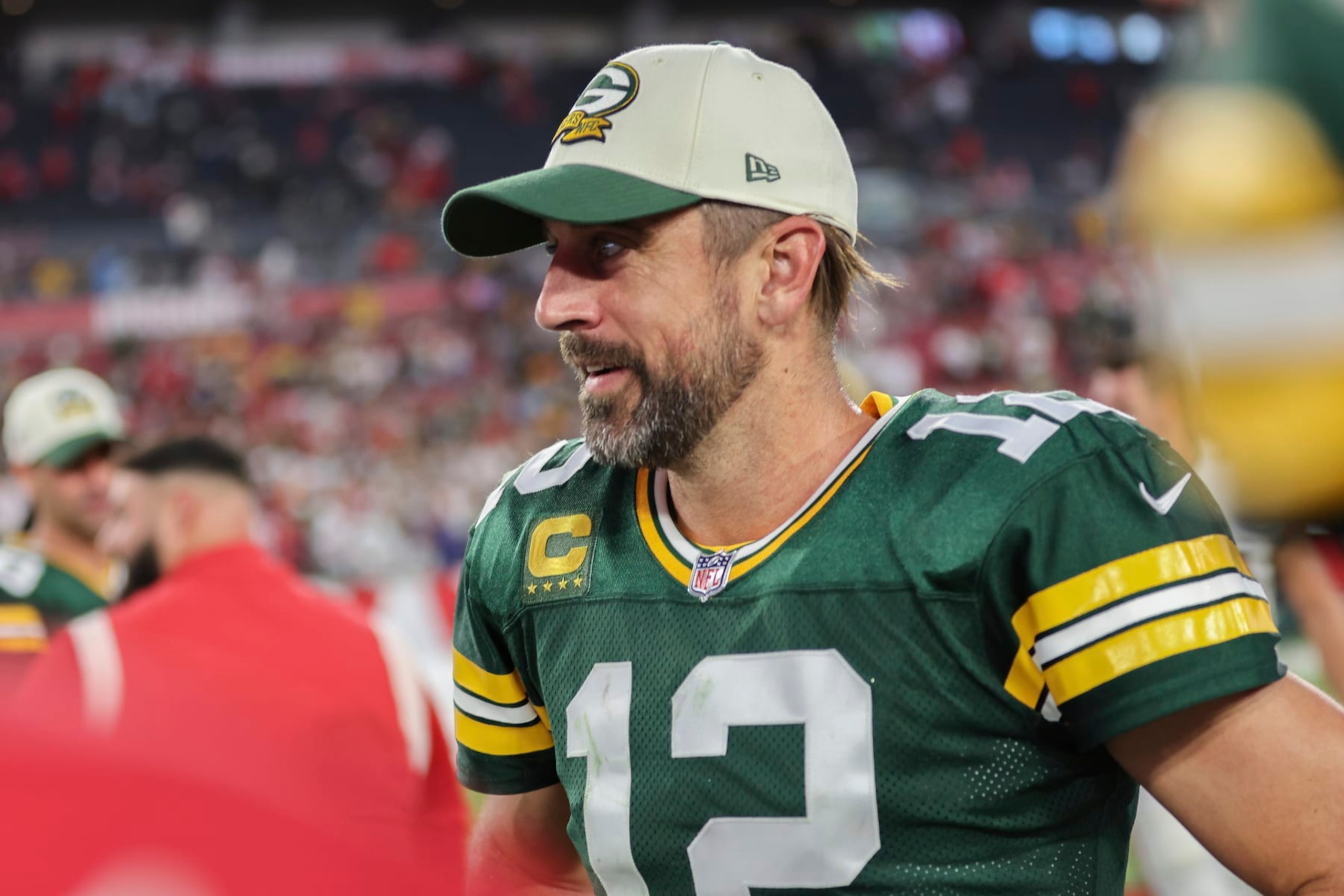 Green Bay Packers quarterback Aaron Rodgers (12) smiles after winning a NFL football game against the Tampa Bay Buccaneers, Sunday, September 25, 2022 in Tampa, Fla. (AP Photo/Alex Menendez)
