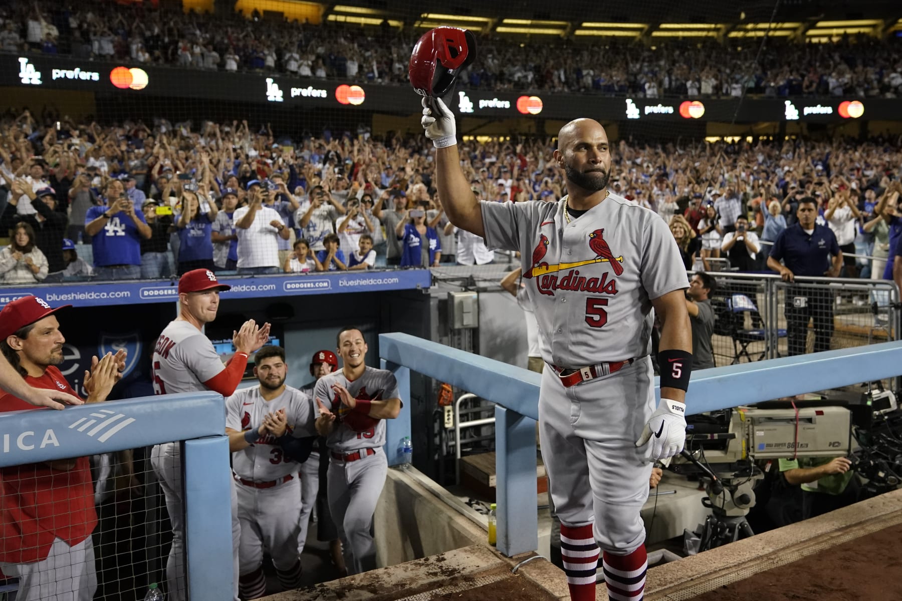 LOS ANGELES, CALIFORNIA - SEPTEMBER 23: Albert Pujols #5 of the St. Louis Cardinals acknowledges the crowd after hitting his 700th career home run at Dodger Stadium on September 23, 2022 in Los Angeles, California. (Photo by Ashley Landis - Pool/Getty Images)