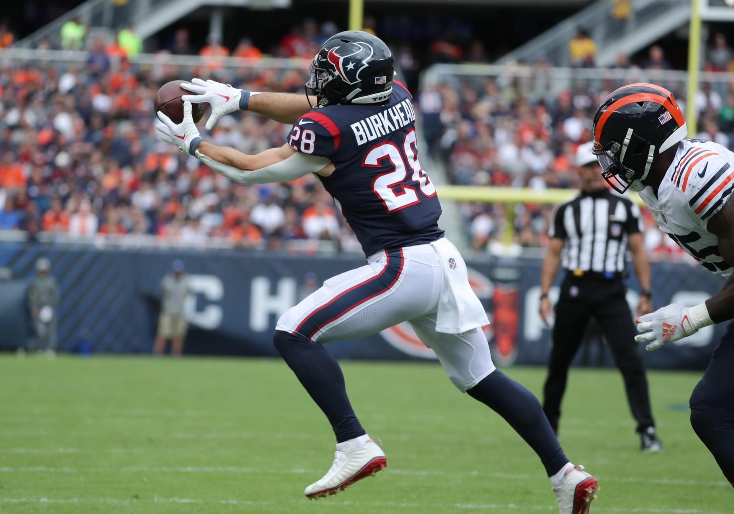 CHICAGO, IL - SEPTEMBER 25: Houston Texans running back Rex Burkhead (28) makes a catch during a game between the Houston Texans and the Chicago Bears on September 25, 2022 at Soldier Field in Chicago, IL. (Photo by Melissa Tamez/Icon Sportswire via Getty Images)