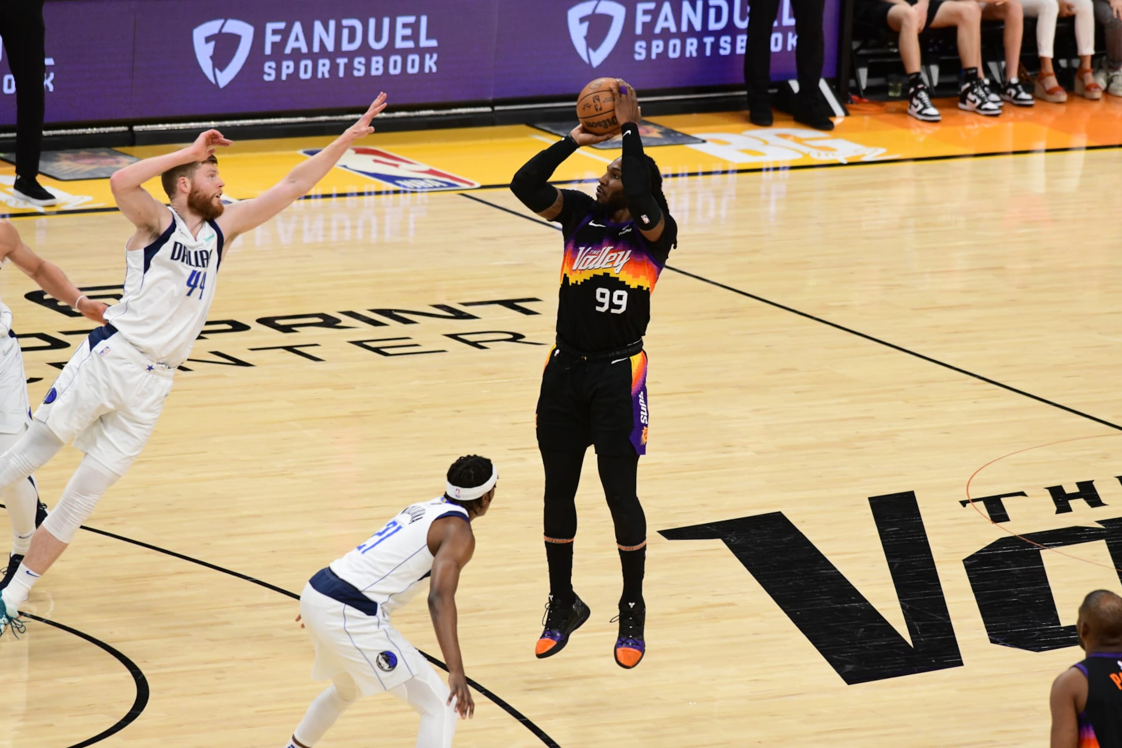 PHOENIX, AZ - MAY 15: Jae Crowder #99 of the Phoenix Suns shoots a three point basket against the Dallas Mavericks during Game 7 of the 2022 NBA Playoffs Western Conference Semifinals on May 15, 2022 at Footprint Center in Phoenix, Arizona. NOTE TO USER: User expressly acknowledges and agrees that, by downloading and or using this photograph, user is consenting to the terms and conditions of the Getty Images License Agreement. Mandatory Copyright Notice: Copyright 2022 NBAE (Photo by Kate Frese/NBAE via Getty Images)