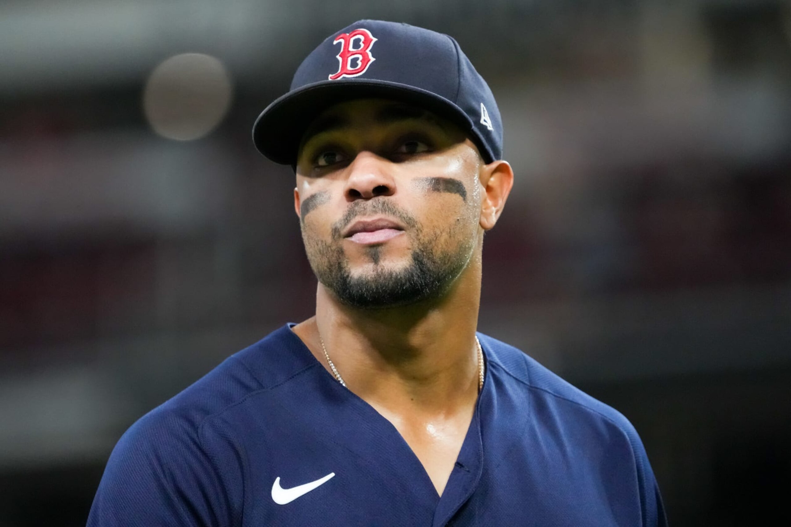 CINCINNATI, OHIO - SEPTEMBER 20: Xander Bogaerts #2 of the Boston Red Sox walks across the field in the fifth inning against the Cincinnati Reds at Great American Ball Park on September 20, 2022 in Cincinnati, Ohio. (Photo by Dylan Buell/Getty Images)