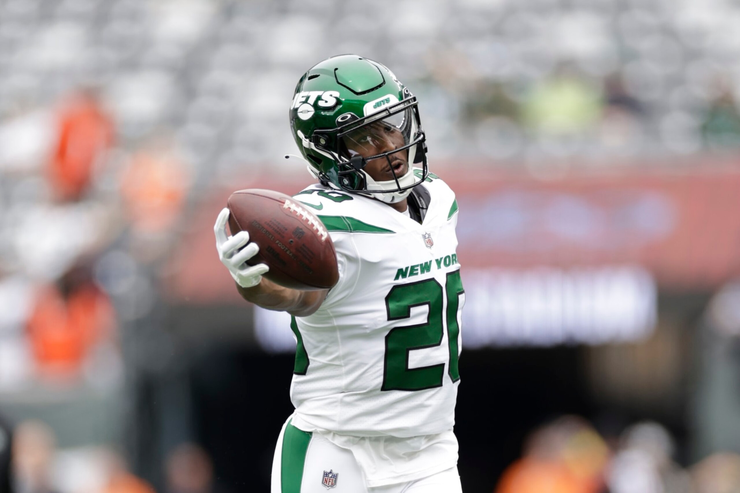 New York Jets running back Breece Hall (20) warms up before an NFL football game against the Cincinnati Bengals Sunday, Sept. 25, 2022, in East Rutherford, N.J. (AP Photo/Adam Hunger)