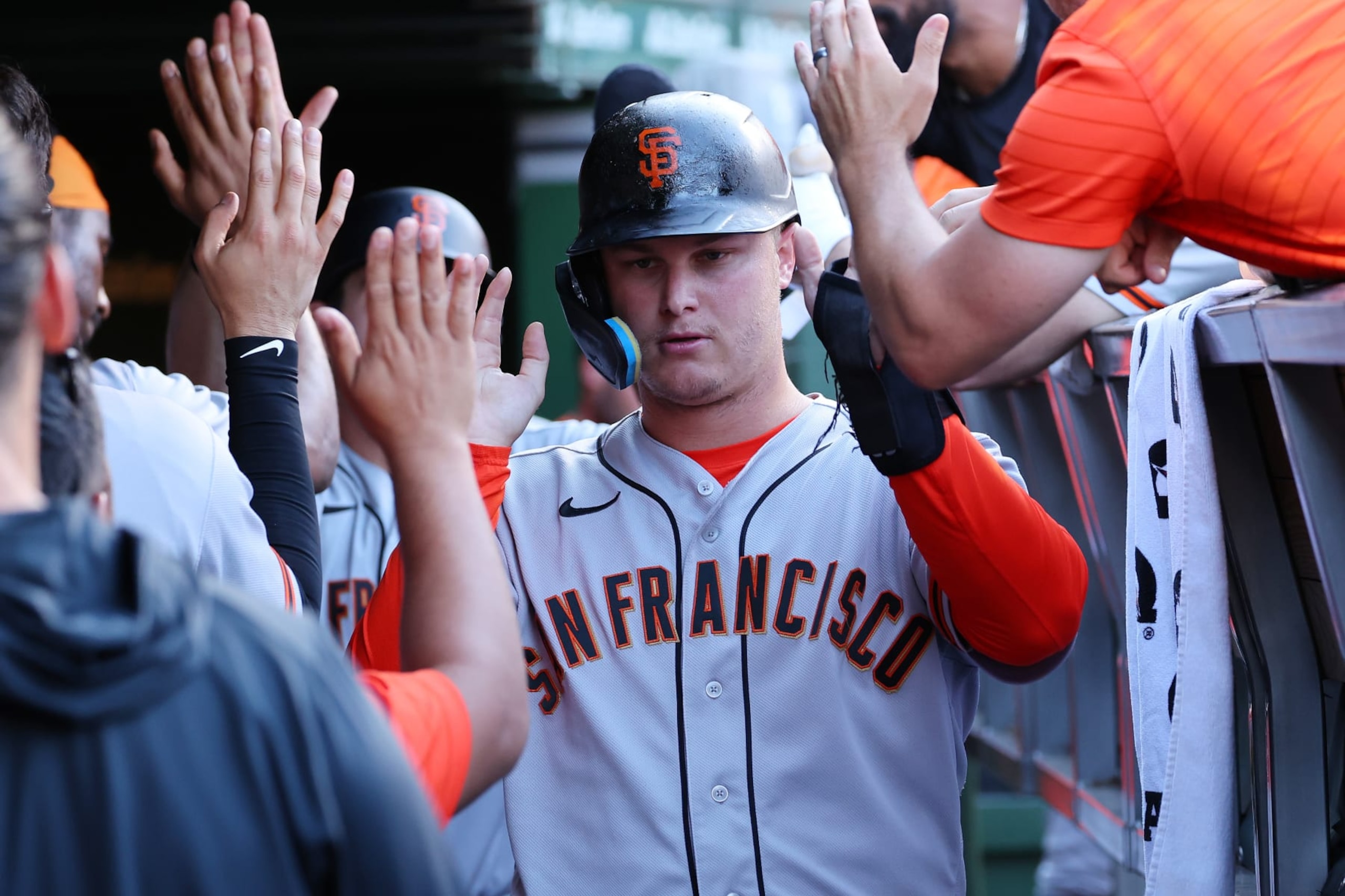 CHICAGO, ILLINOIS - SEPTEMBER 09: Joc Pederson #23 of the San Francisco Giants high fives teammates after scoring a run against the Chicago Cubs during the eighth inningat Wrigley Field on September 09, 2022 in Chicago, Illinois. (Photo by Michael Reaves/Getty Images) CHICAGO, ILLINOIS - SEPTEMBER 09: Joc Pederson #23 of the San Francisco Giants high fives teammates after scoring a run against the Chicago Cubs during the eighth inningat Wrigley Field on September 09, 2022 in Chicago, Illinois. (Photo by Michael Reaves/Getty Images)