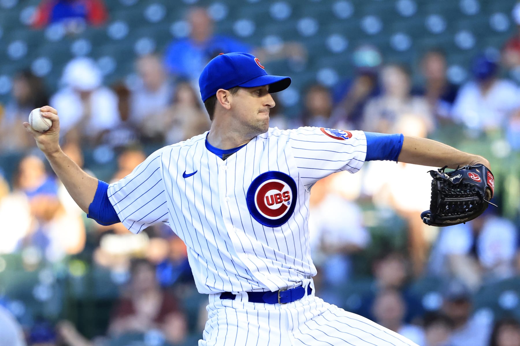 CHICAGO, ILLINOIS - JUNE 30: Kyle Hendricks #28 of the Chicago Cubs throws a pitch during the first inning in the game against the Cincinnati Reds at Wrigley Field on June 30, 2022 in Chicago, Illinois. (Photo by Justin Casterline/Getty Images)