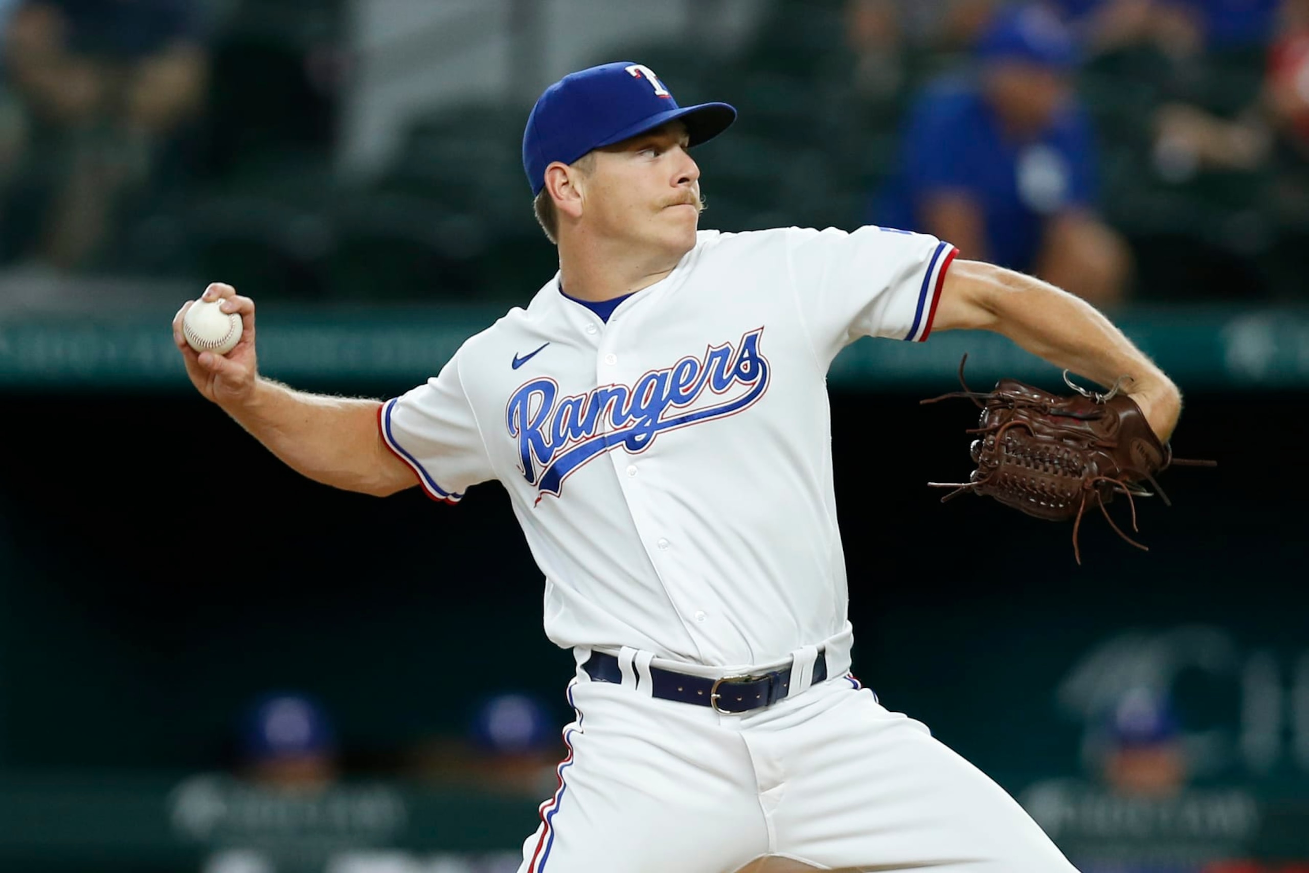 ARLINGTON, TEXAS - AUGUST 02: Spencer Howard #31 of the Texas Rangers throws a pitch in the first inning against the Baltimore Orioles at Globe Life Field on August 02, 2022 in Arlington, Texas. (Photo by Tim Heitman/Getty Images)
