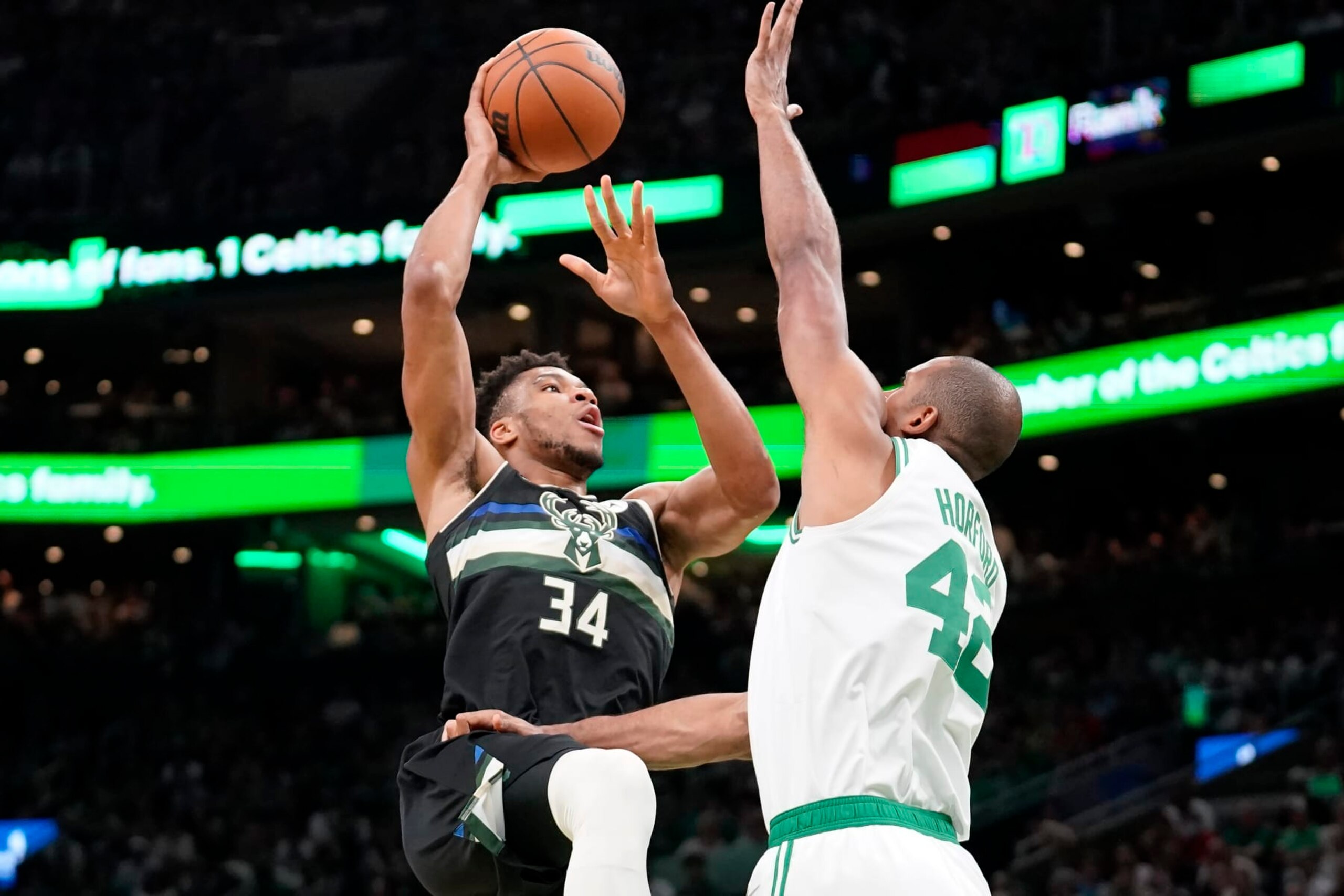 Milwaukee Bucks forward Giannis Antetokounmpo (34) shoots at the basket as Boston Celtics center Al Horford (42) defends during the first half of Game 7 of an NBA basketball Eastern Conference semifinals playoff series, Sunday, May 15, 2022, in Boston. (AP Photo/Steven Senne) Milwaukee Bucks forward Giannis Antetokounmpo (34) shoots at the basket as Boston Celtics center Al Horford (42) defends during the first half of Game 7 of an NBA basketball Eastern Conference semifinals playoff series, Sunday, May 15, 2022, in Boston. (AP Photo/Steven Senne)