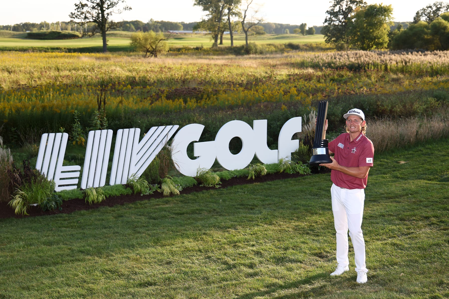 SUGAR GROVE, ILLINOIS - SEPTEMBER 18: Team Captain Cameron Smith of Punch GC poses with the trophy after winning the individual title during Day Three of the LIV Golf Invitational - Chicago at Rich Harvest Farms on September 18, 2022 in Sugar Grove, Illinois. (Photo by Joe Scarnici/LIV Golf via Getty Images)
