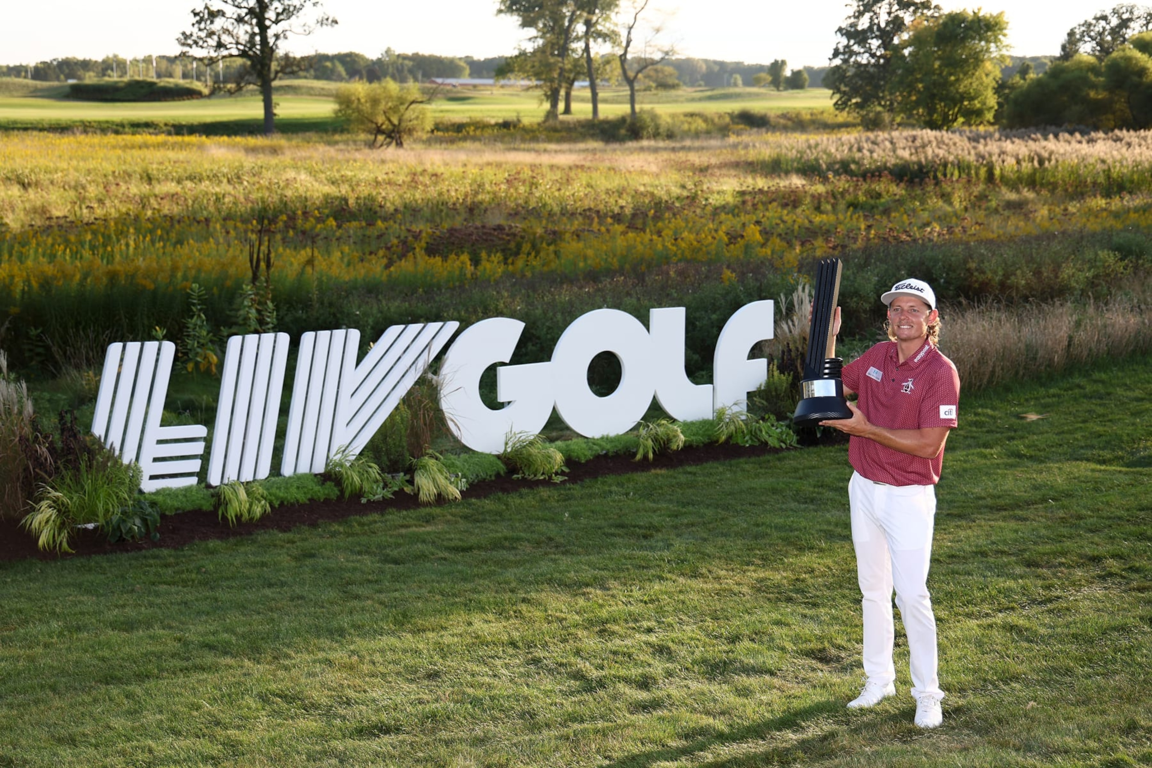 SUGAR GROVE, ILLINOIS - SEPTEMBER 18: Team Captain Cameron Smith of Punch GC poses with the trophy after winning the individual title during Day Three of the LIV Golf Invitational - Chicago at Rich Harvest Farms on September 18, 2022 in Sugar Grove, Illinois. (Photo by Joe Scarnici/LIV Golf via Getty Images)