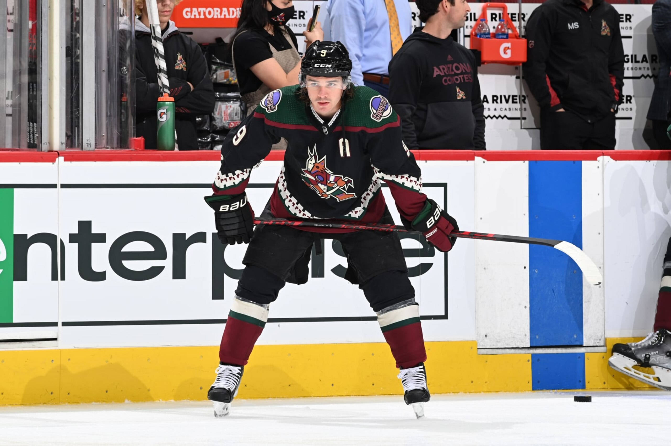 GLENDALE, ARIZONA - MARCH 22: Clayton Keller #9 of the Arizona Coyotes warms up prior to a game against the Seattle Kraken at Gila River Arena on March 22, 2022 in Glendale, Arizona. (Photo by Norm Hall/NHLI via Getty Images)