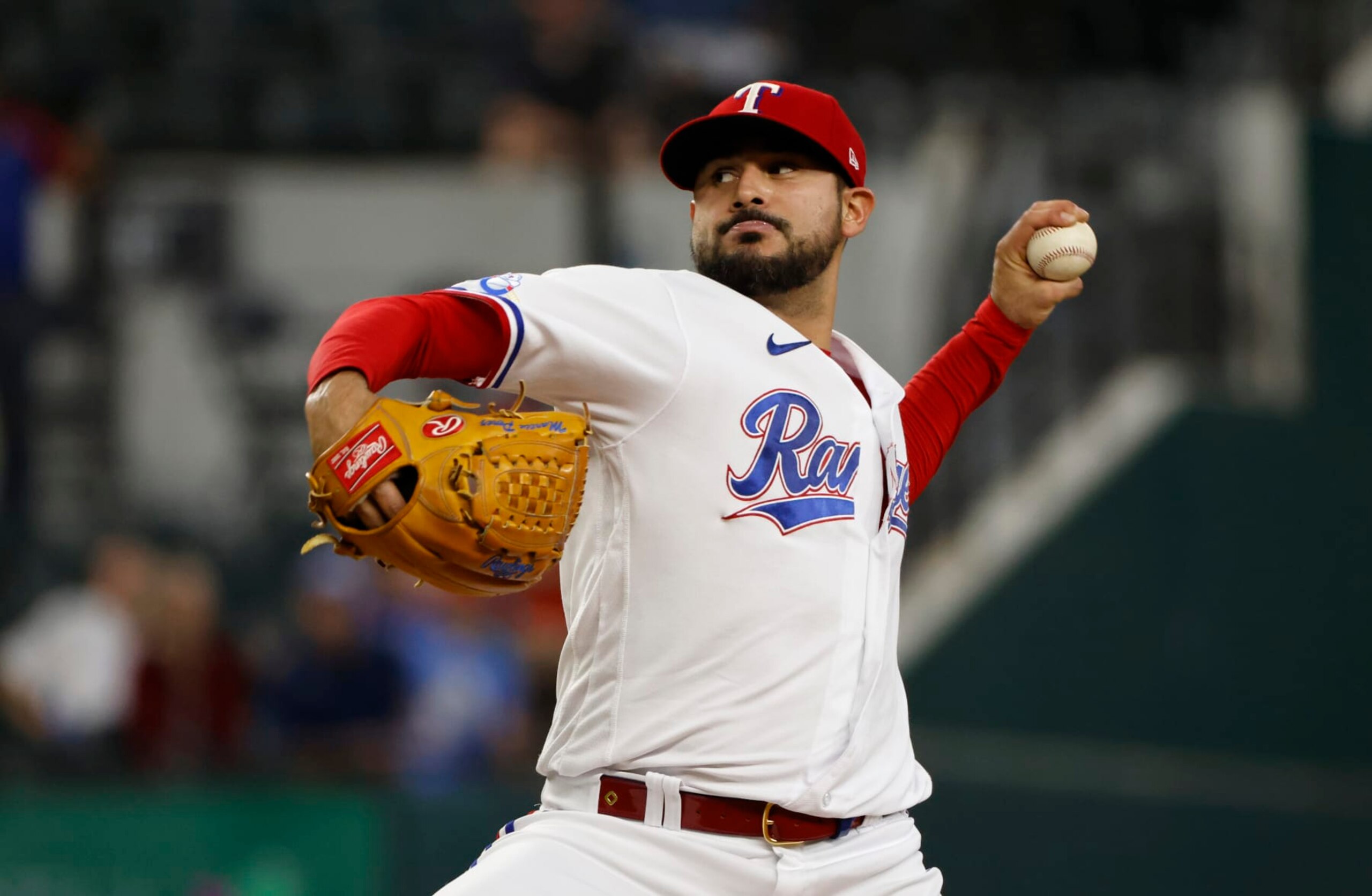 ARLINGTON, TX - SEPTEMBER 22: Martin Perez #54 of the Texas Rangers pitches against the Los Angeles Angels during the second inning at Globe Life Field on September 22, 2022 in Arlington, Texas. (Photo by Ron Jenkins/Getty Images)