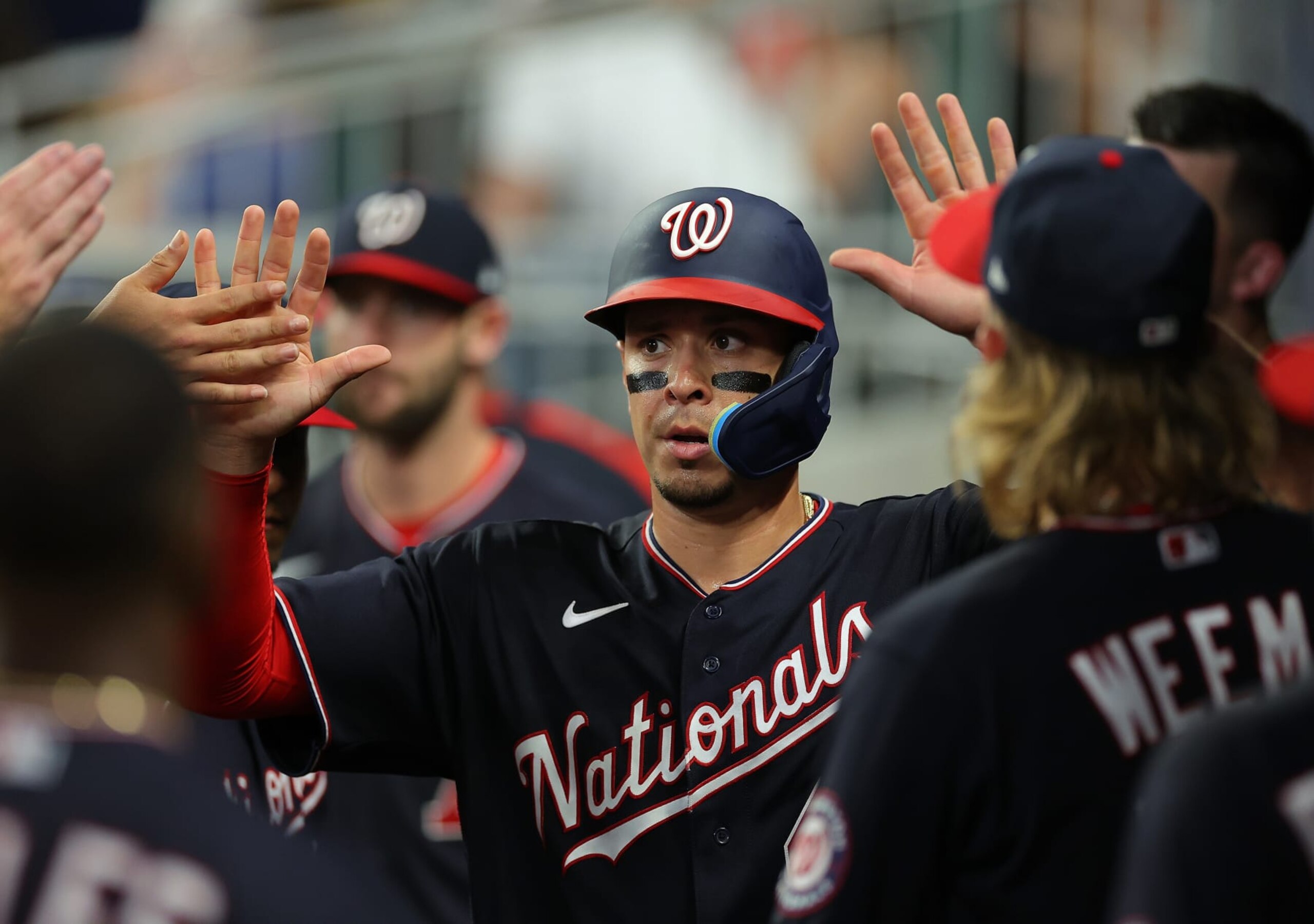 ATLANTA, GEORGIA - SEPTEMBER 20:  Joey Meneses #45 of the Washington Nationals reacts after scoring in the sixth inning on a fielder's choice by Cesar Hernandez #1 and a throwing error by Vaughn Grissom #18 of the Atlanta Braves at Truist Park on September 20, 2022 in Atlanta, Georgia. (Photo by Kevin C. Cox/Getty Images)