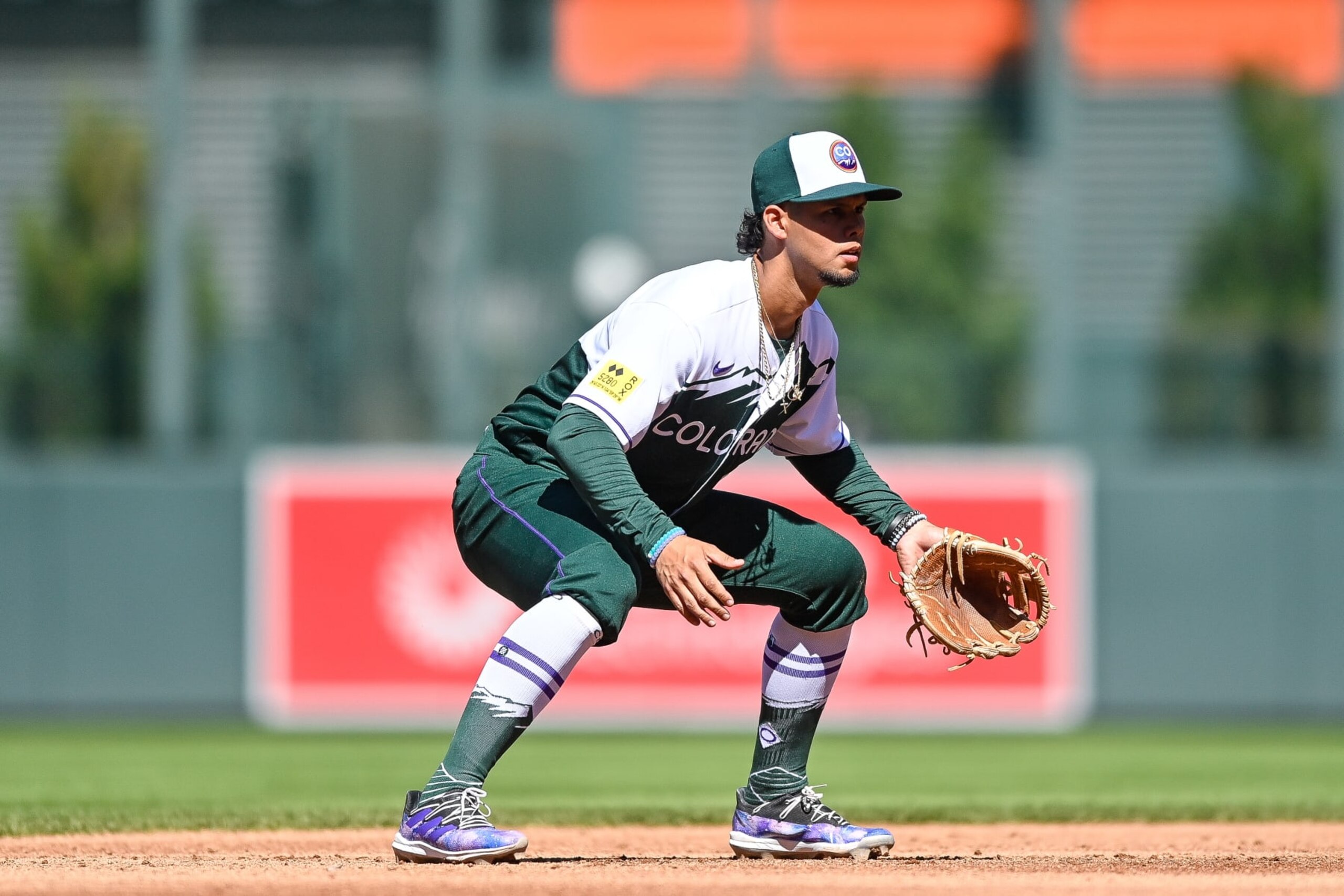 DENVER, CO - SEPTEMBER 25: Ezequiel Tovar #14 of the Colorado Rockies plays defense at shortstop in the third inning of a game against the San Diego Padres at Coors Field on September 25, 2022 in Denver, Colorado. (Photo by Dustin Bradford/Getty Images)