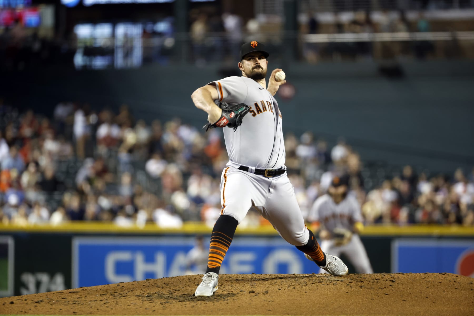PHOENIX, ARIZONA - SEPTEMBER 23: Starting pitcher Carlos Rodon #16 of the San Francisco Giants throws a pitch during the game against the Arizona Diamondbacks at Chase Field on September 23, 2022 in Phoenix, Arizona. The Giants beat the Diamondbacks 6-5. (Photo by Chris Coduto/Getty Images)