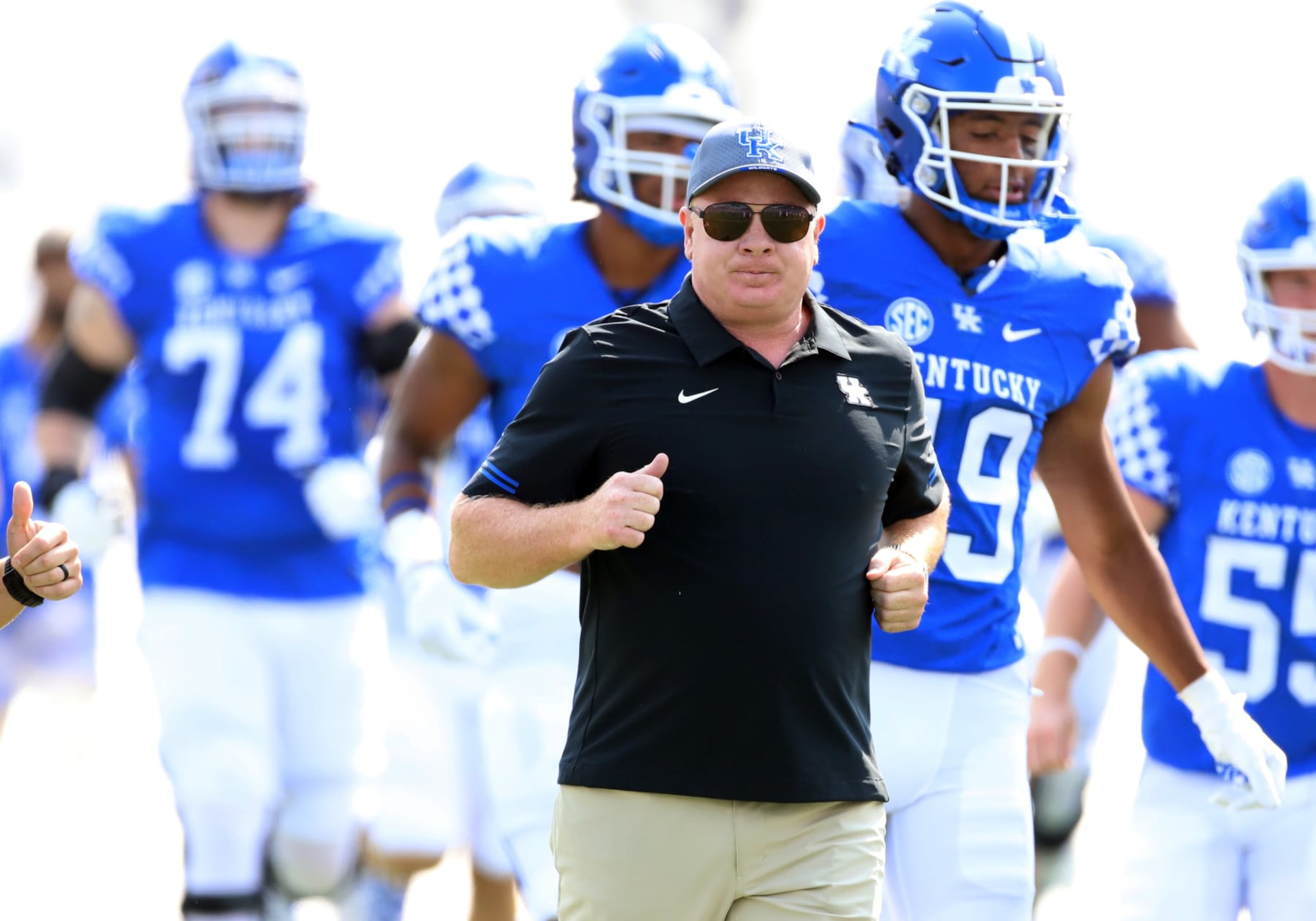 LEXINGTON, KY - SEPTEMBER 17: Kentucky Wildcats head coach Mark Stoops runs onto the field before a game between the Youngstown State Penguins and Kentucky Wildcats on September 17, 2022, at Kroger Field in Lexington, KY. (Photo by Jeff Moreland/Icon Sportswire via Getty Images)